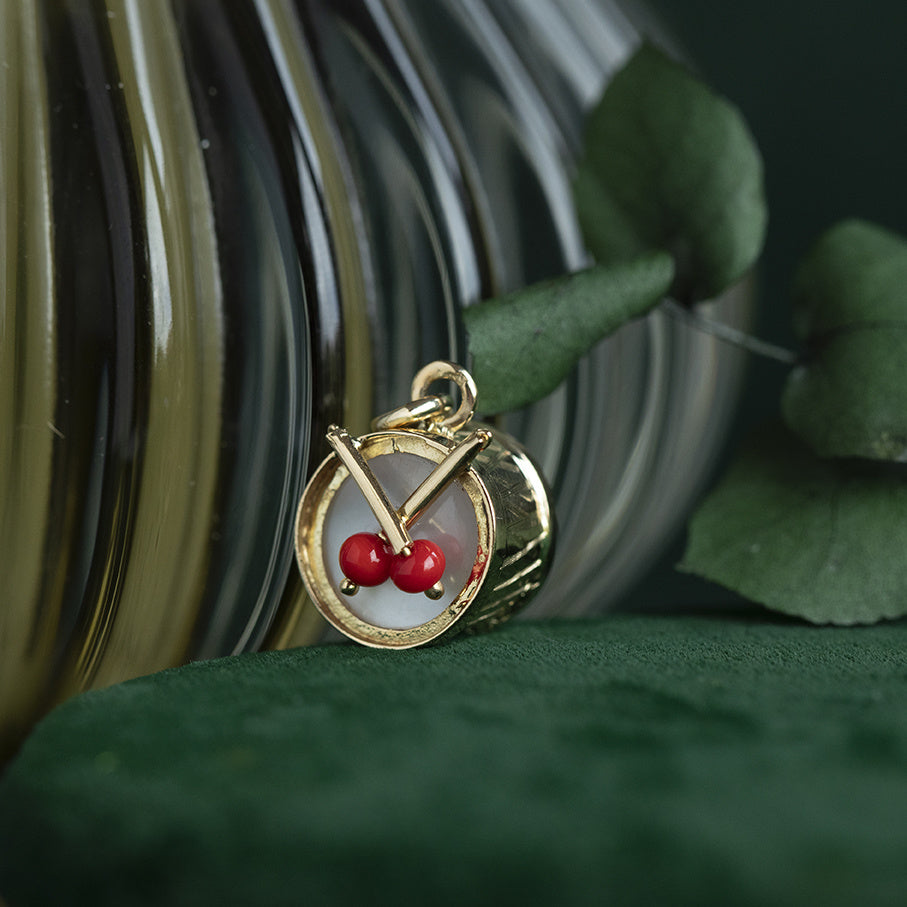 Vintage gold drum pendant with mother-of-pearl and colored stone, 14 kt