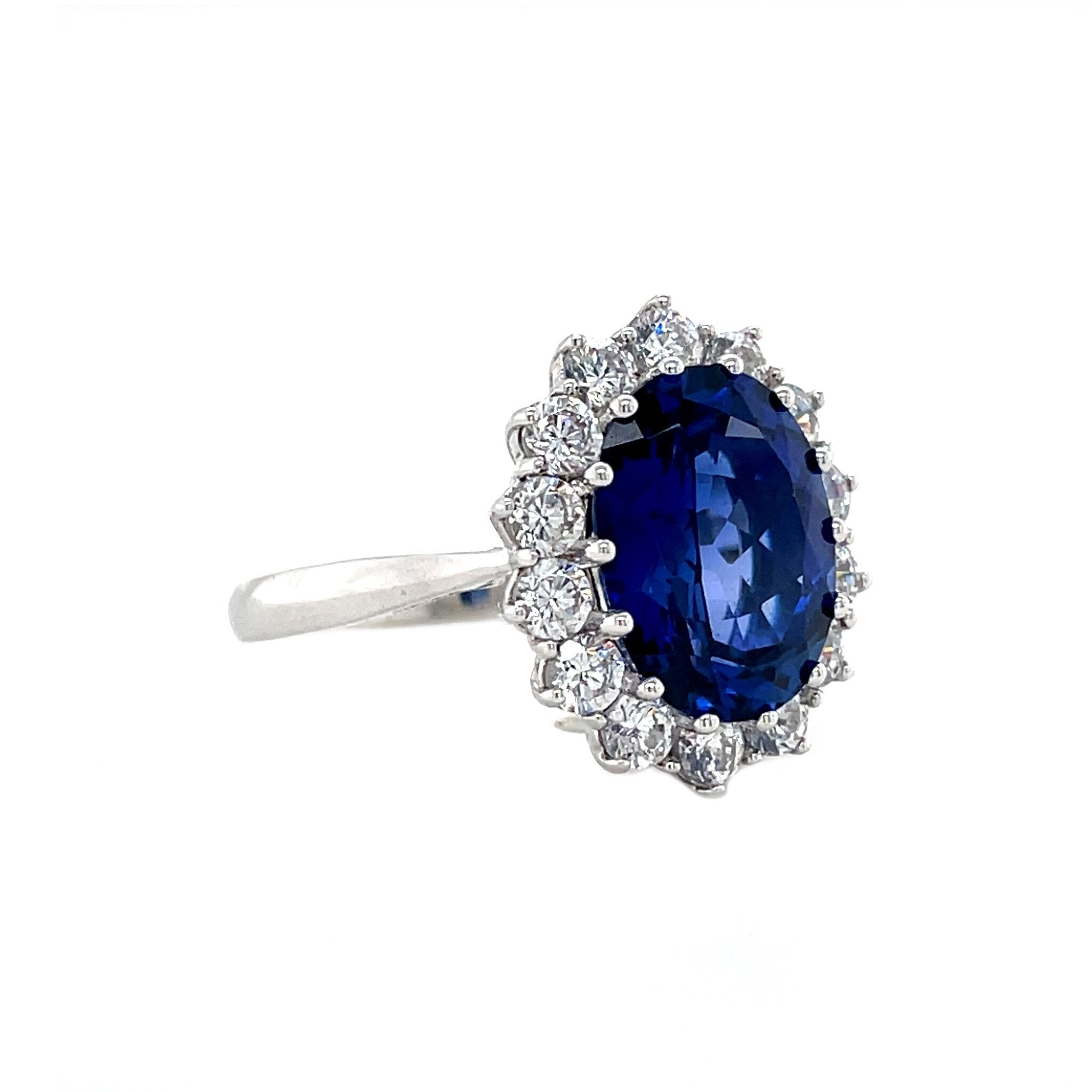 14 kt white gold cluster ring with sapphire and zirconia