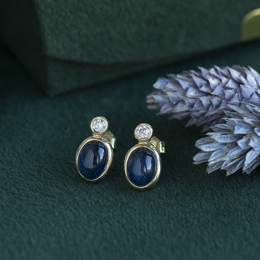 Gold vintage stud earrings with sapphire and moissanite, 14 kt