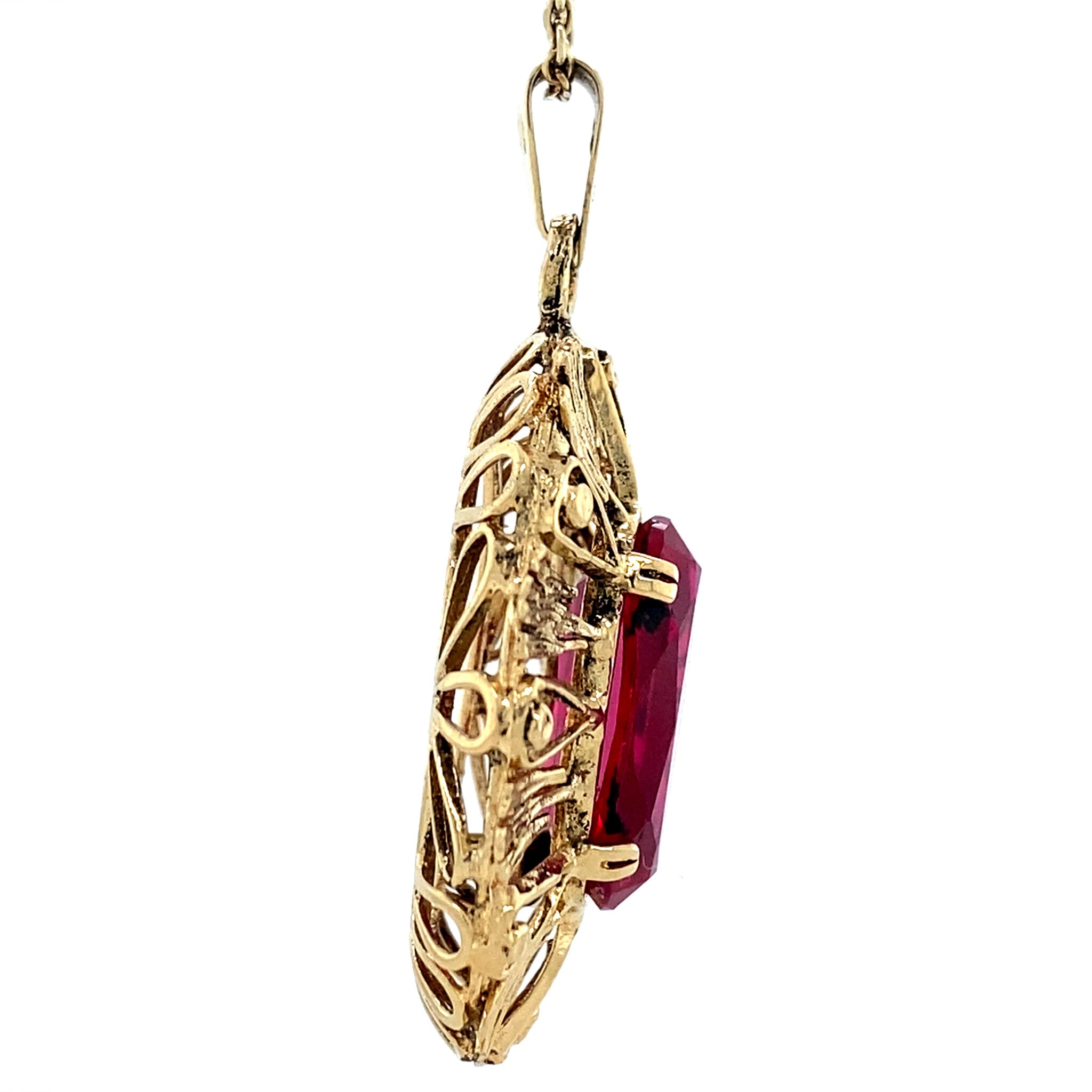 Gouden vintage hanger met robijn 14 krt