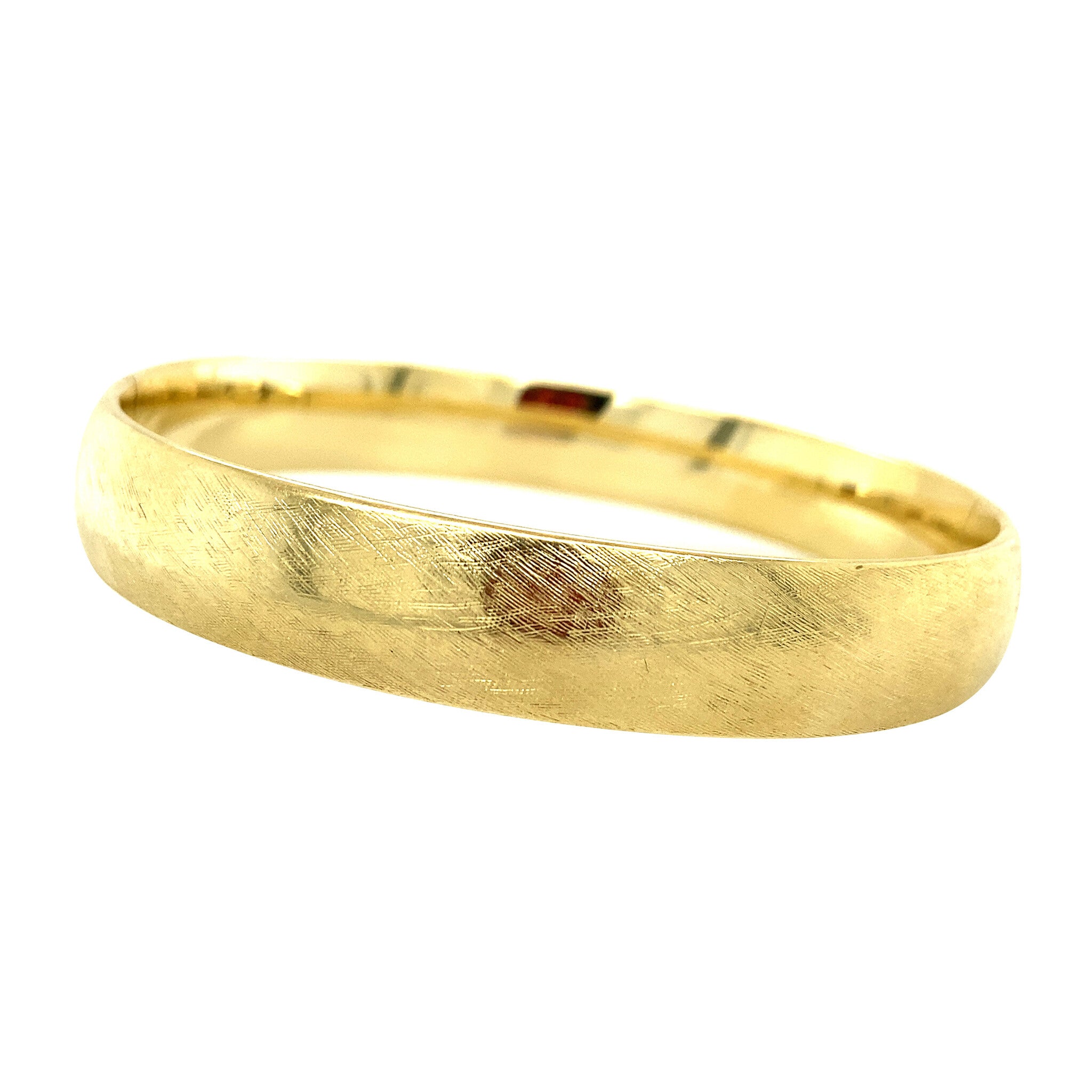 Gold bangle tooled 14 krt