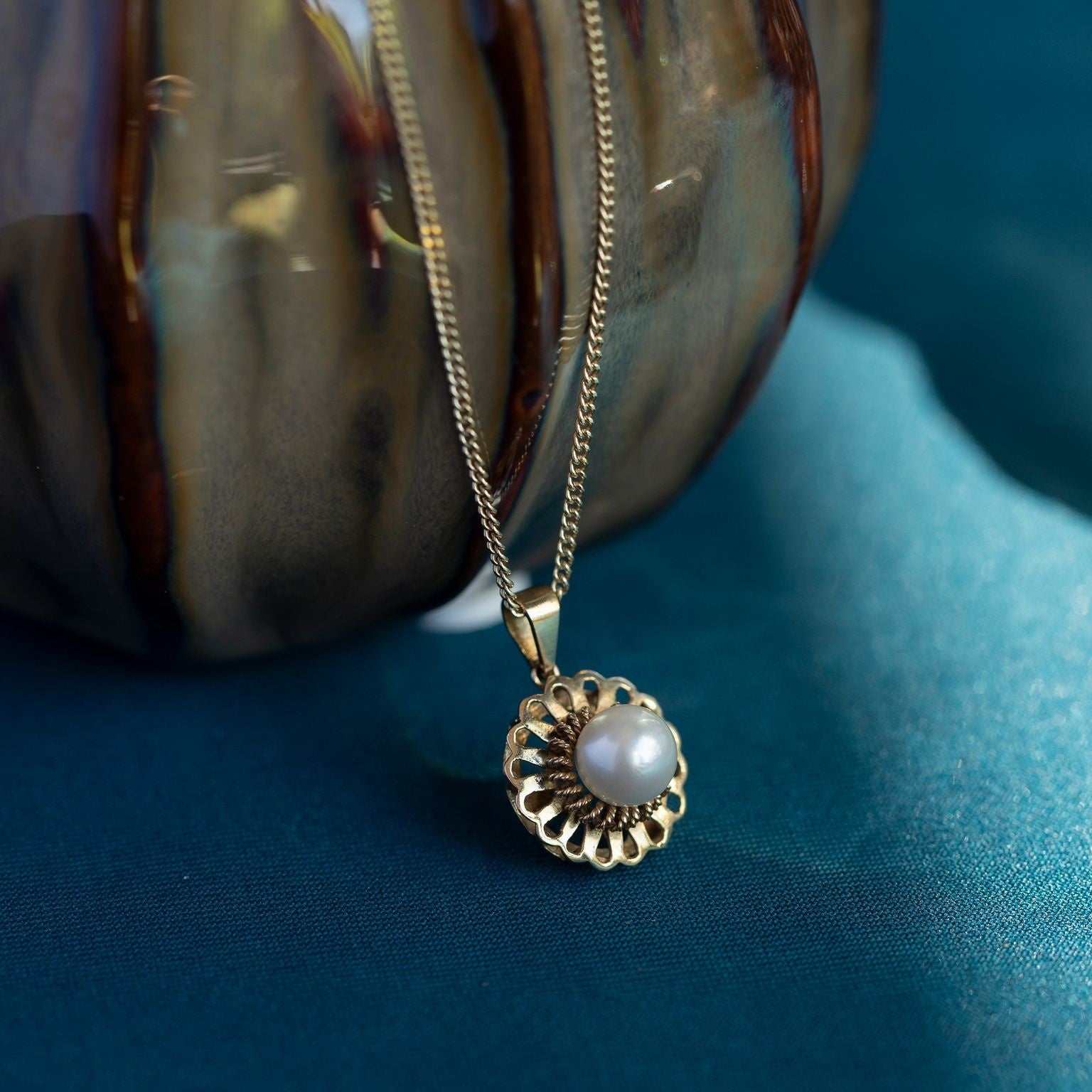 Gouden hanger met parel 14 krt