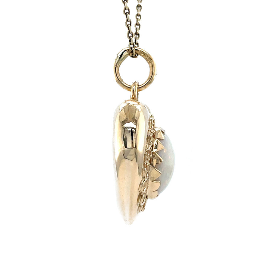 Golden vintage heart pendant with opal 14 kt