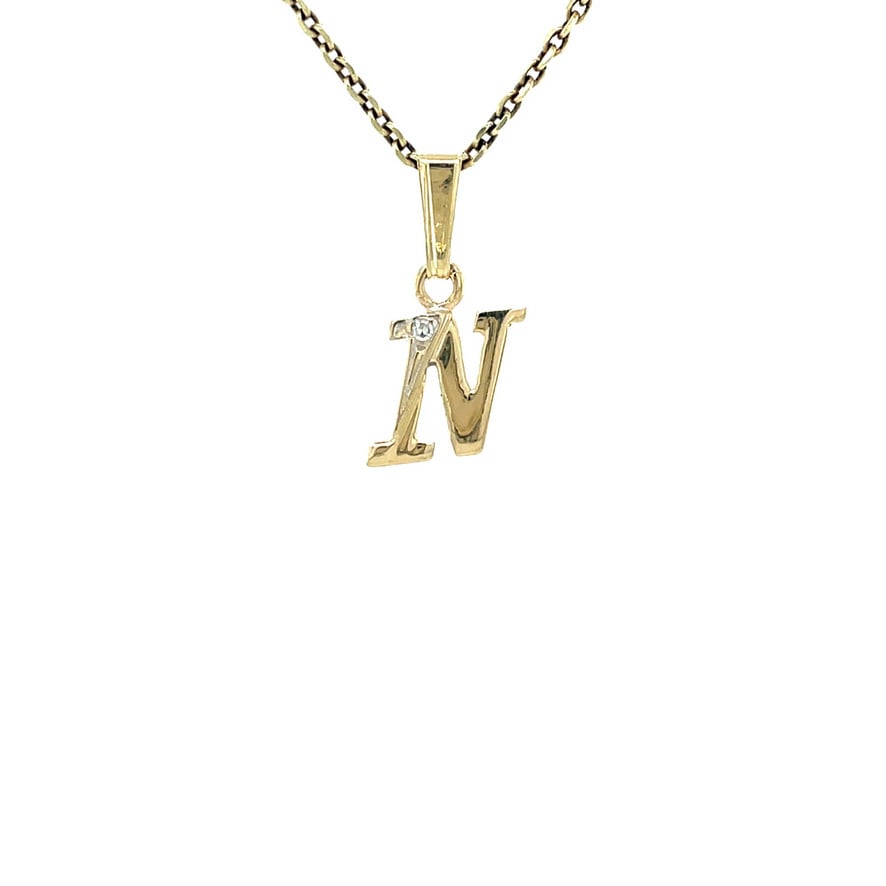 Vintage gold letter 'N' pendant with a diamond, 14 kt