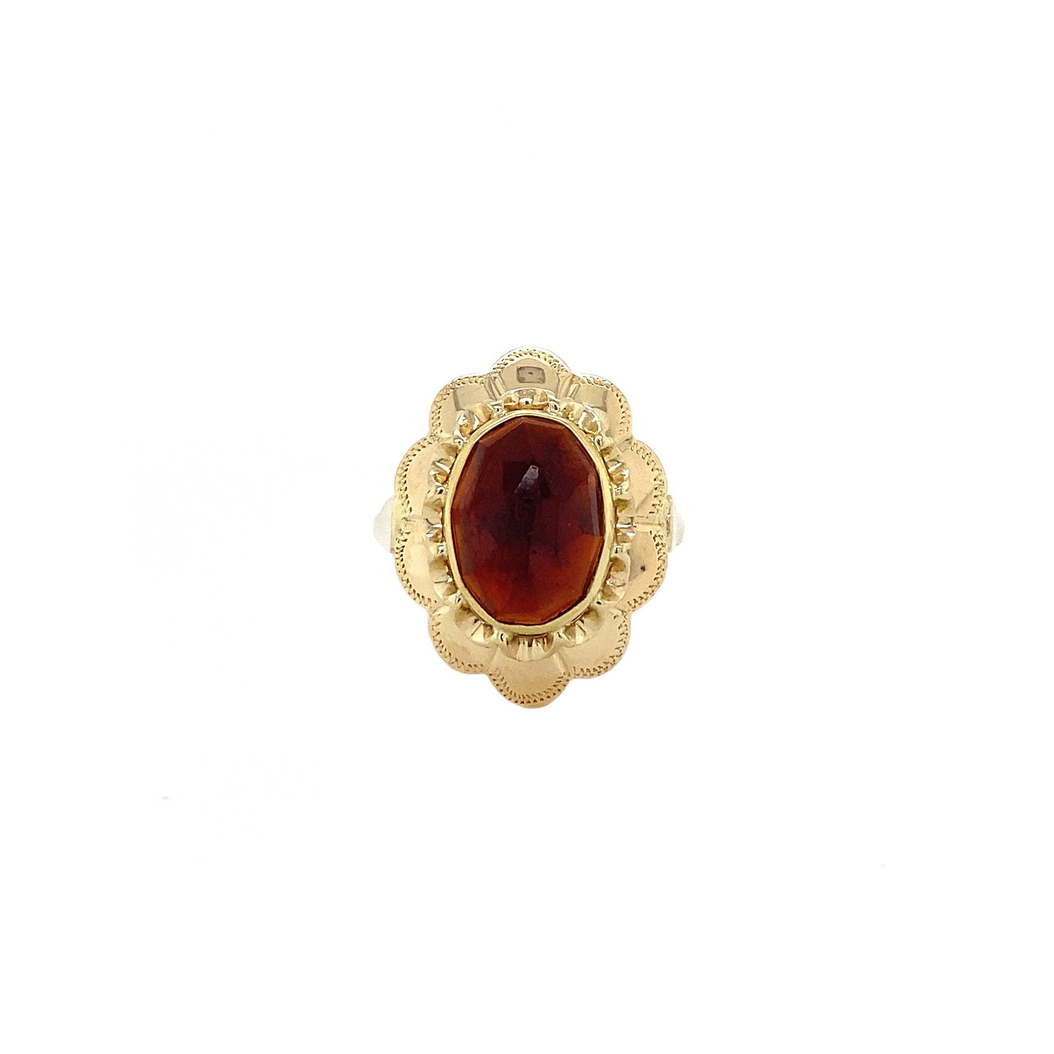Gouden ring met granaat 14 krt