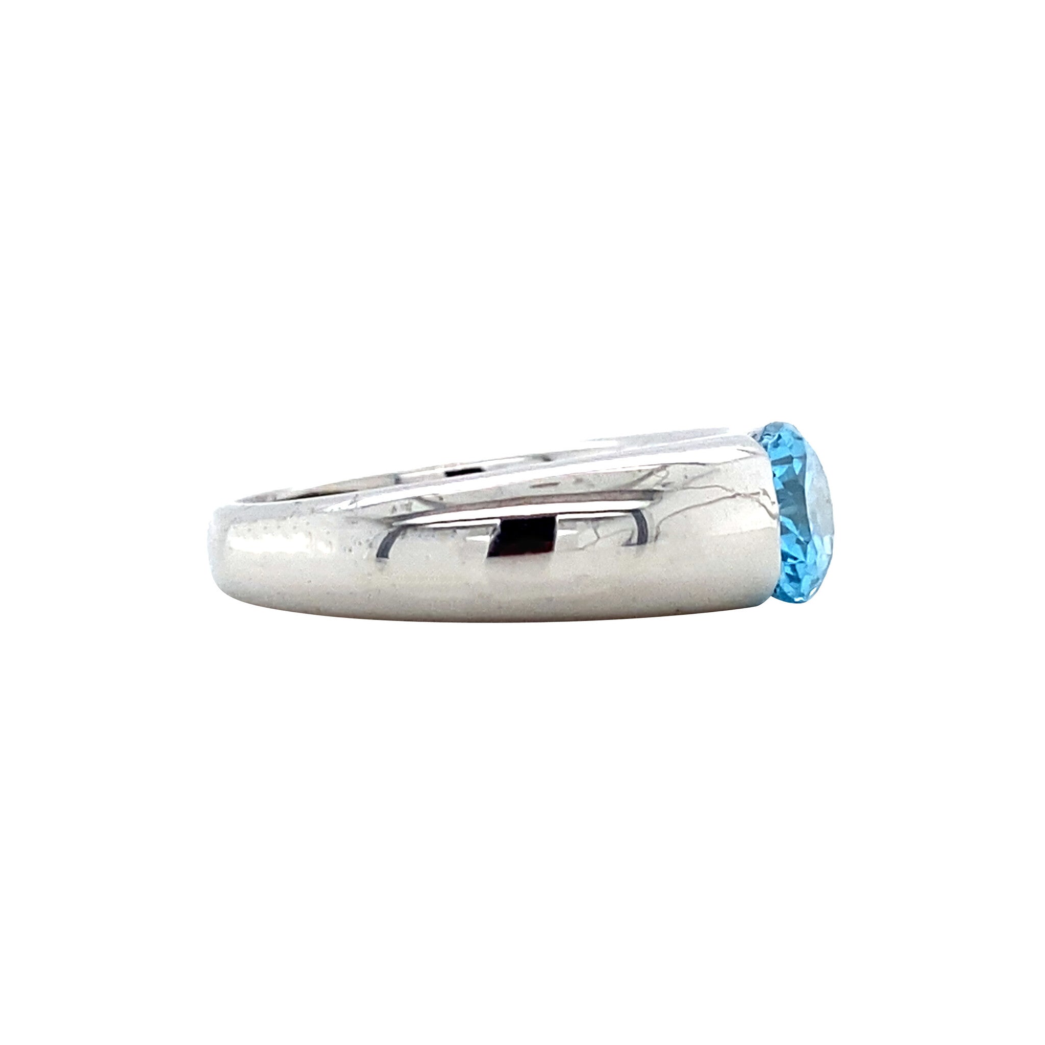 White gold ring with topaz 14 kt