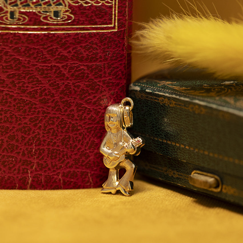 Gouden vintage gitarist hanger 14 kt