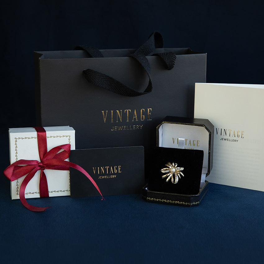 Gold vintage brooch with pearl 14 kt