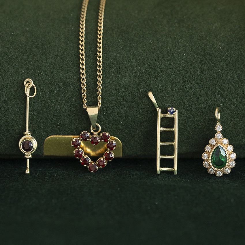 Golden vintage ladder pendant with sapphire 14 kt