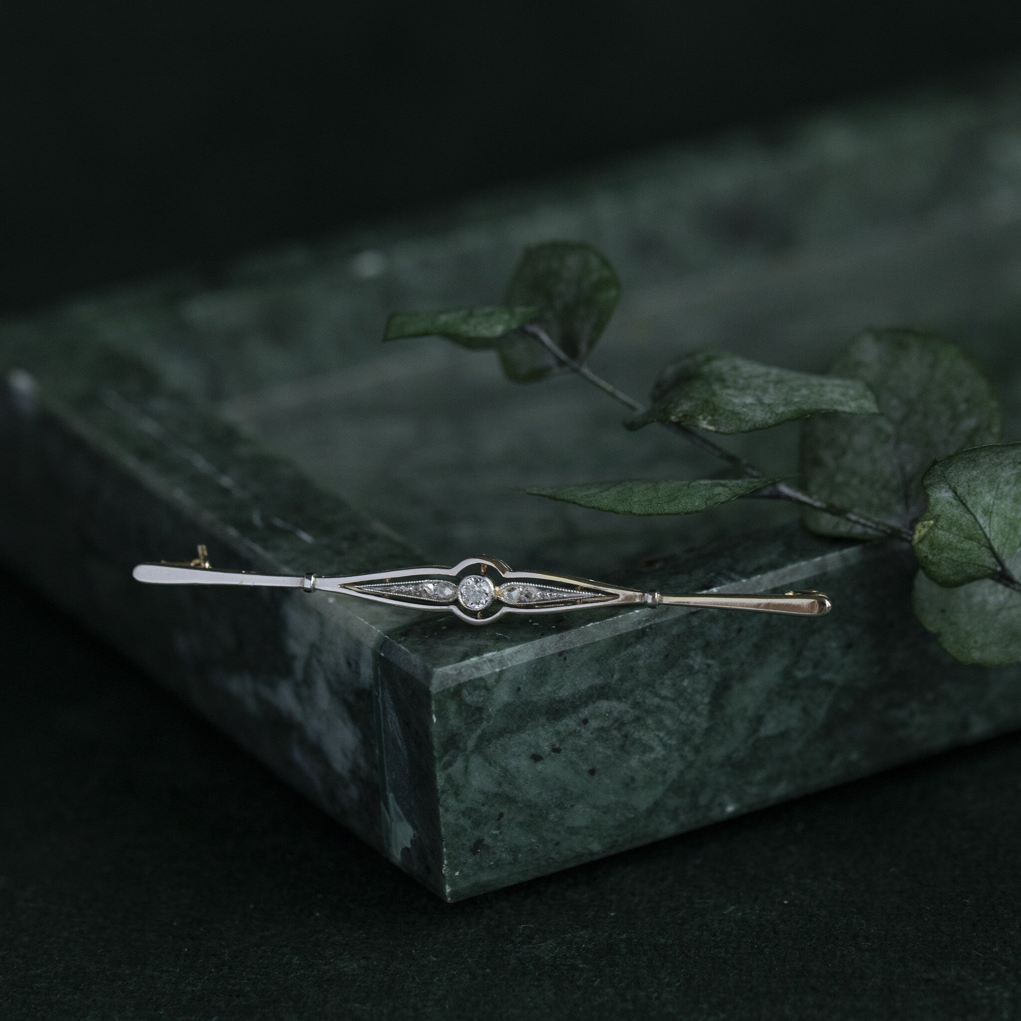 Bicolour gouden broche met diamant 14 krt