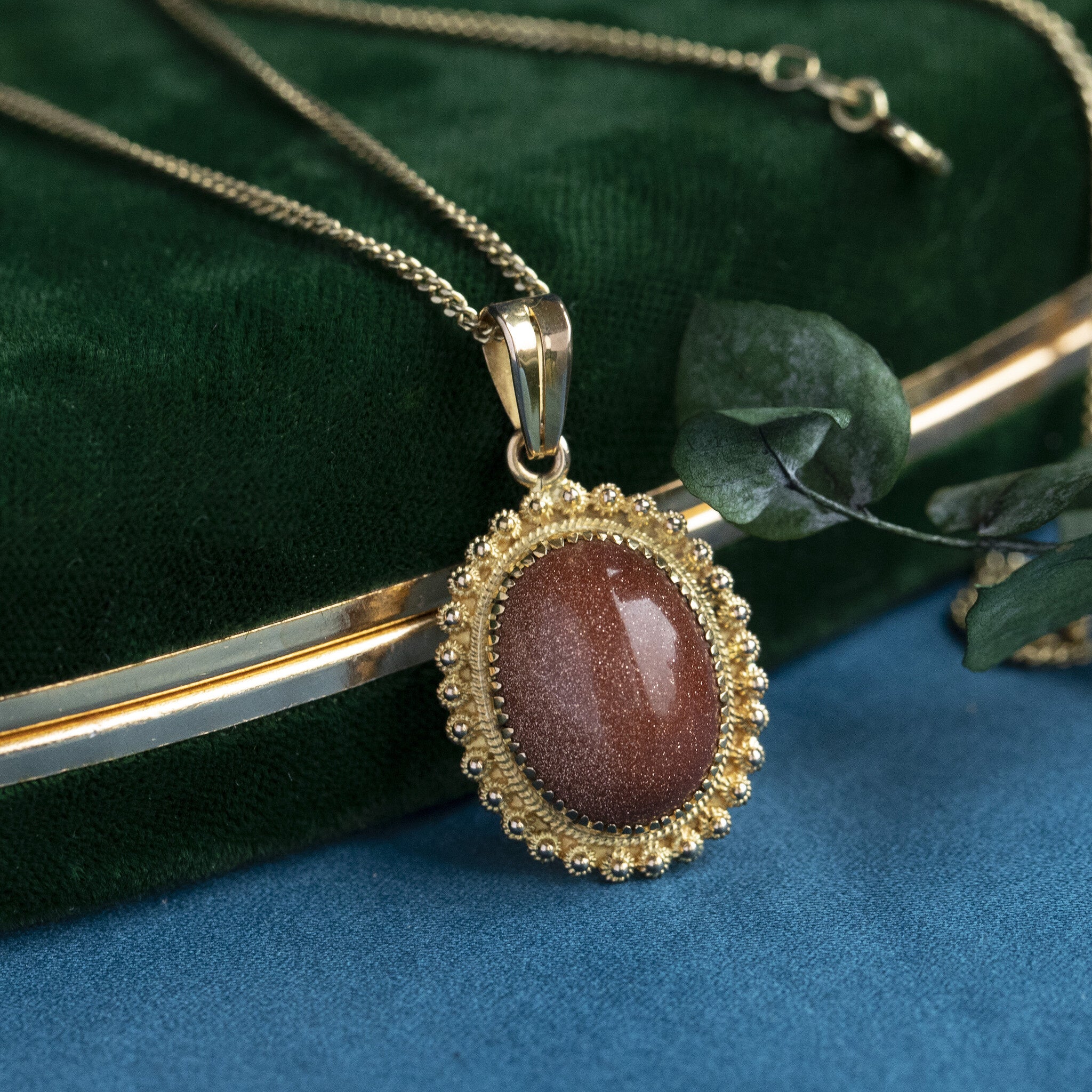 Gouden hanger met goudsteen 14 krt