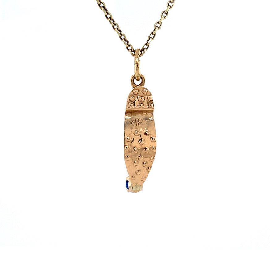 Golden vintage Arabic shoe pendant with spinel 14 kt