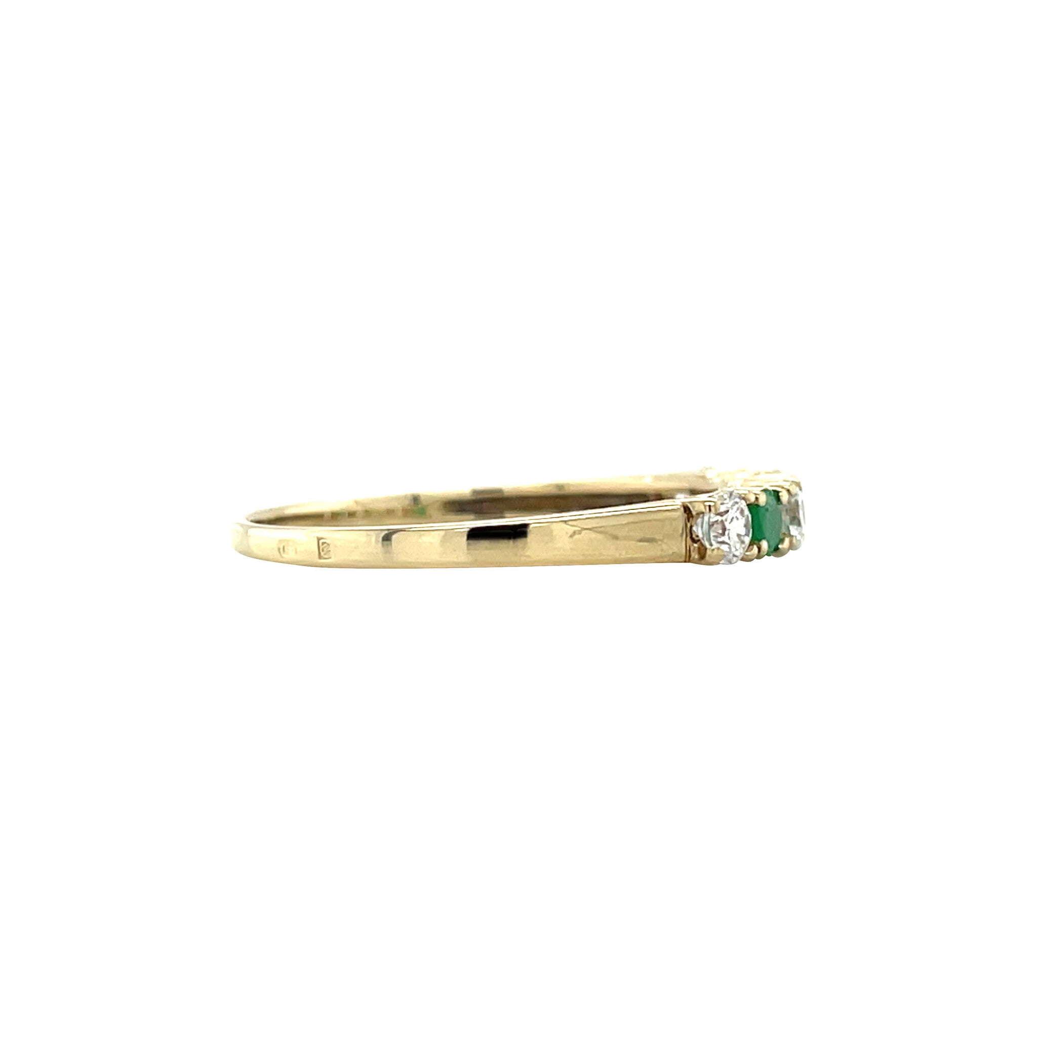 14 kt gold row ring with emerald and zirconia