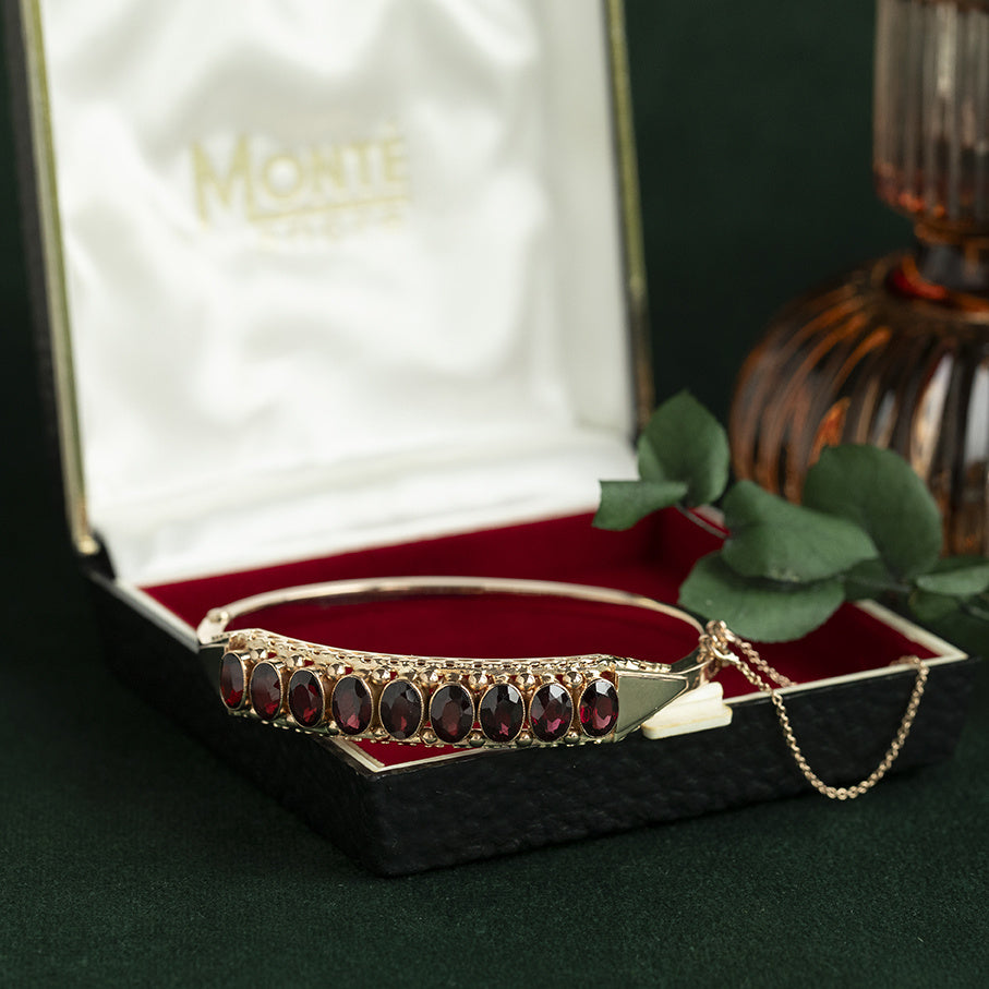 Rose-gold vintage bangle with garnet 14 kt