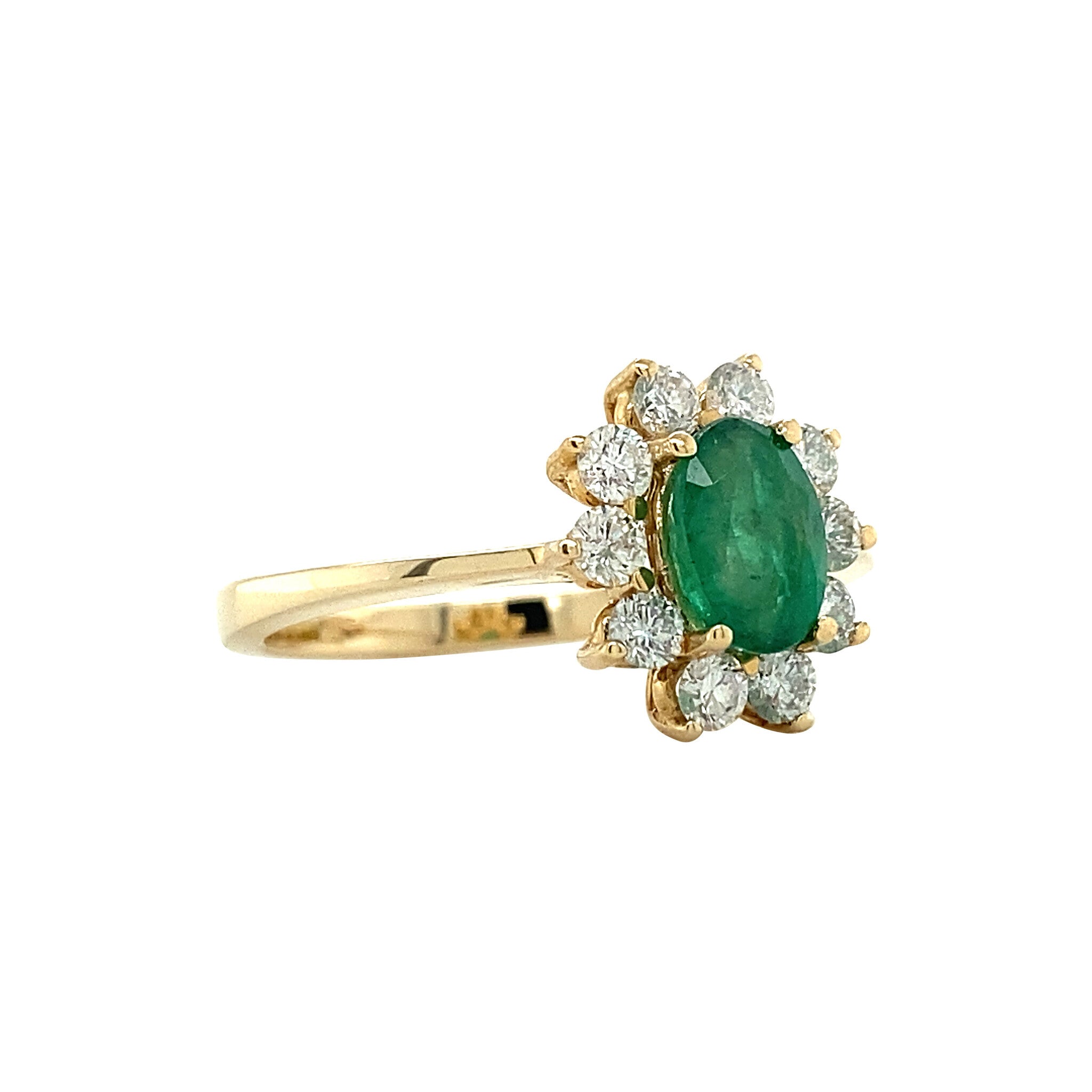 14 kt gold halo ring with emerald and diamond