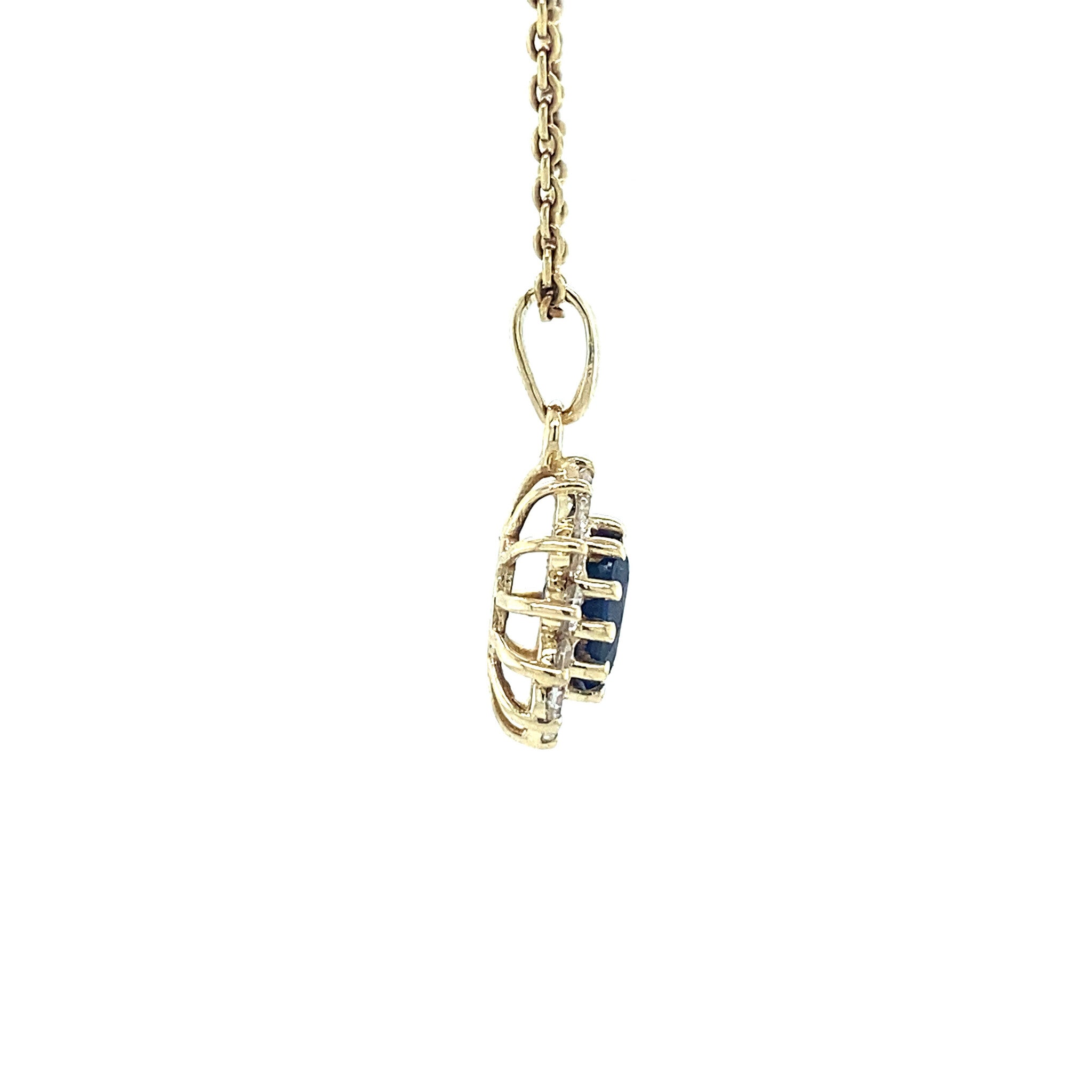 14 kt gold halo pendant with zirconia and sapphire