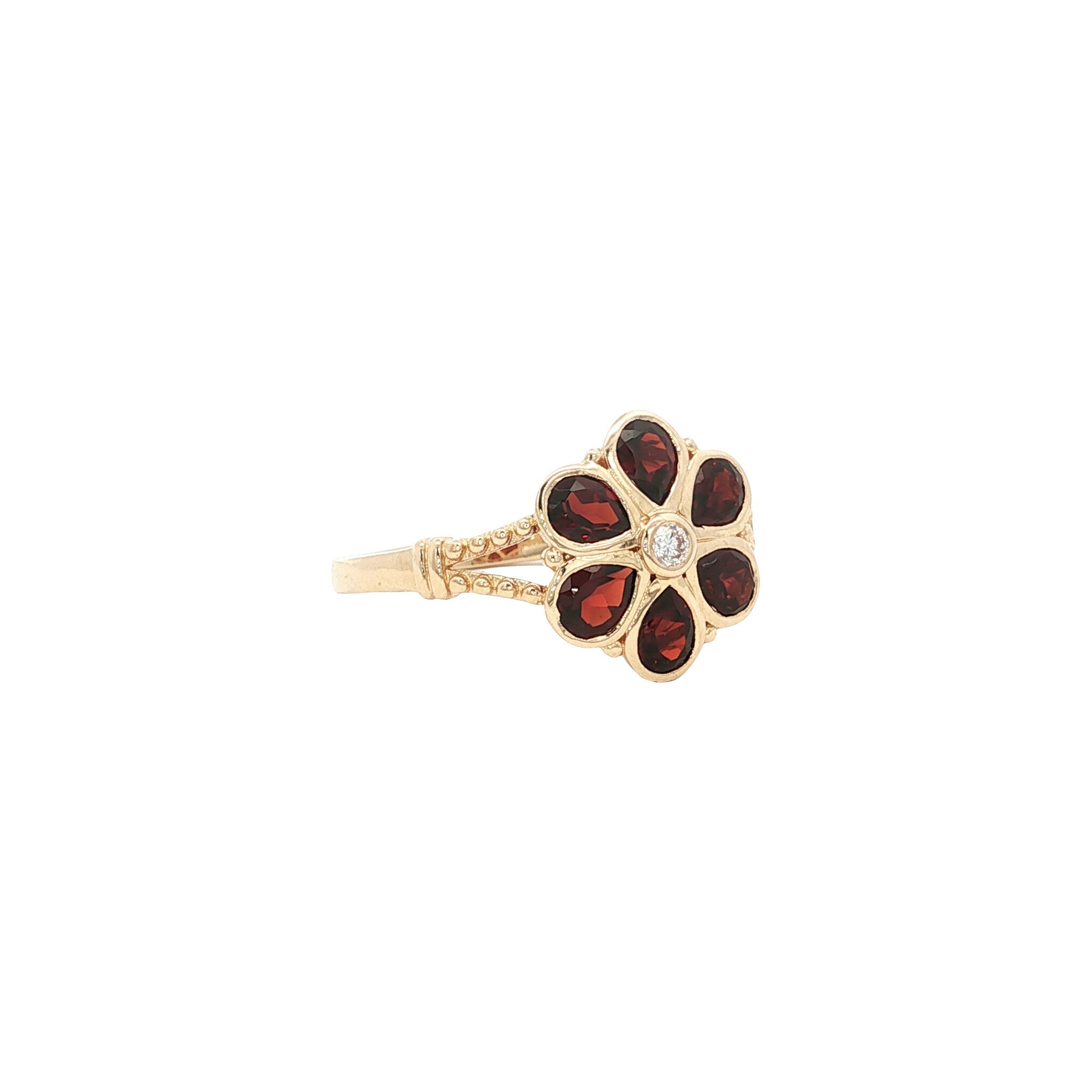 14 kt gold ring with diamond and garnet