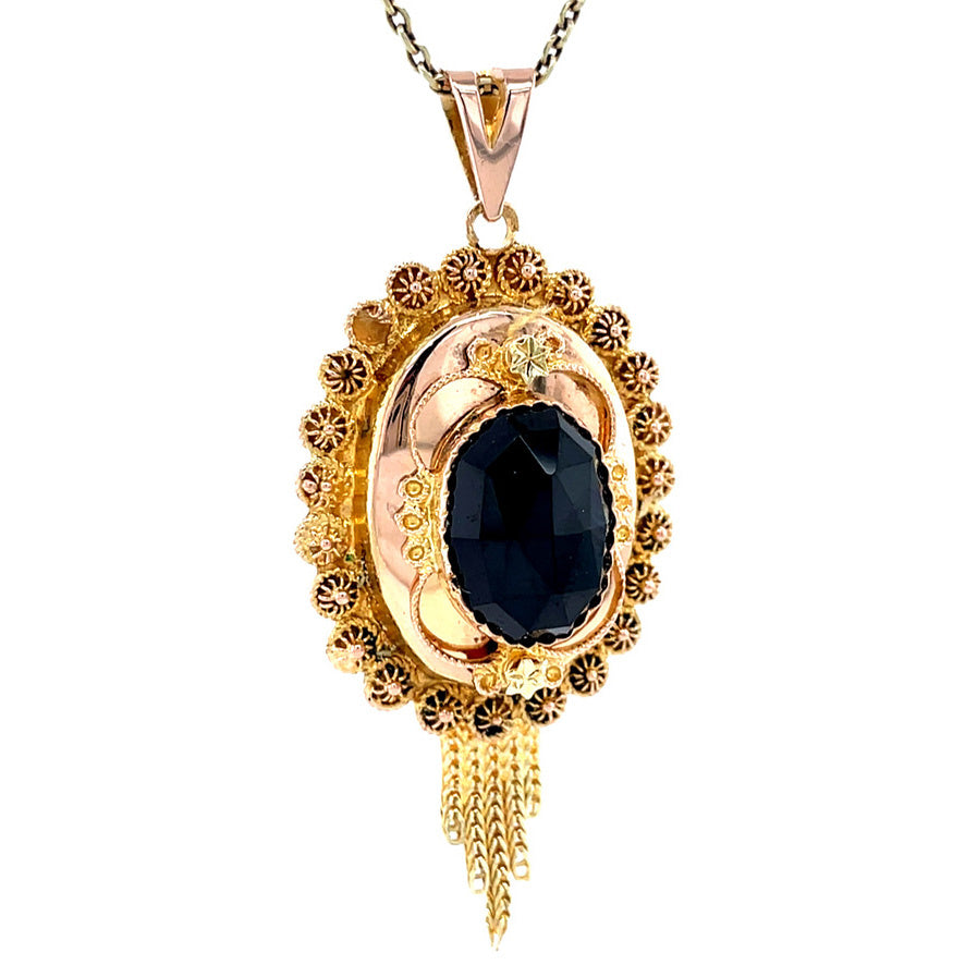 Gold vintage pendant with garnet 14 kt