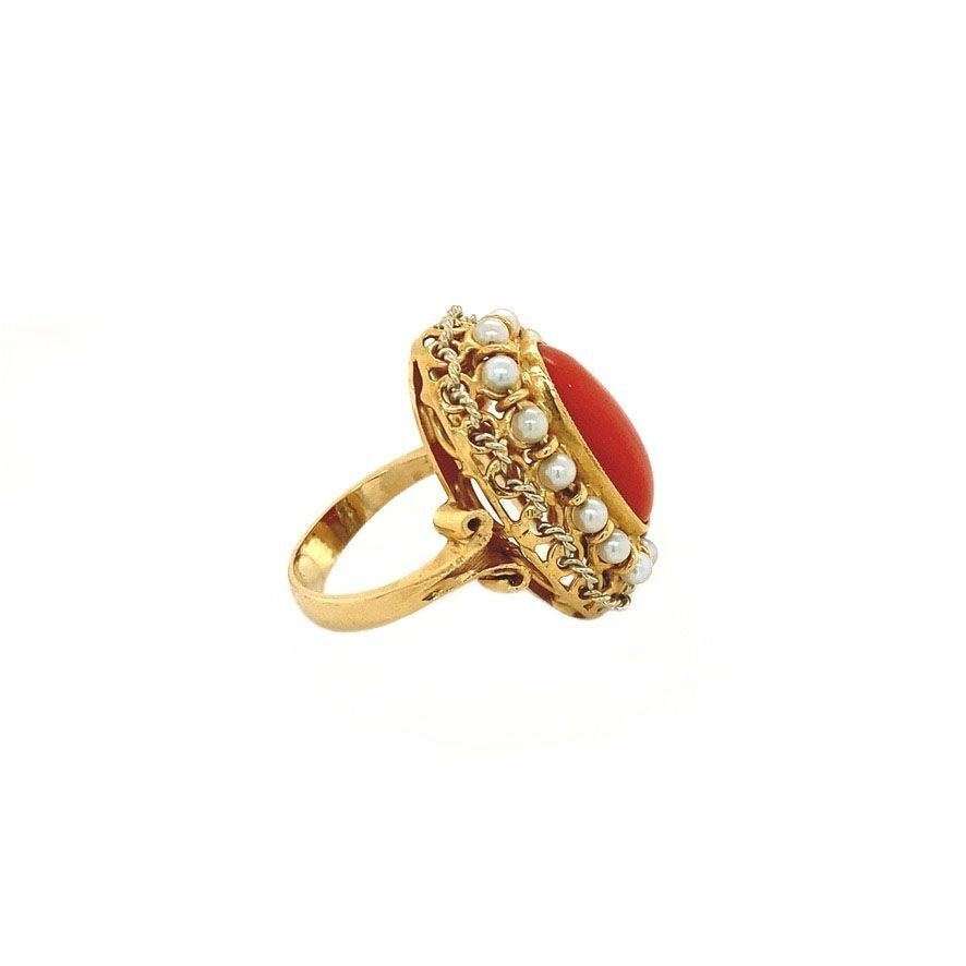 Gold entourage ring with red coral and pearl 18 krt