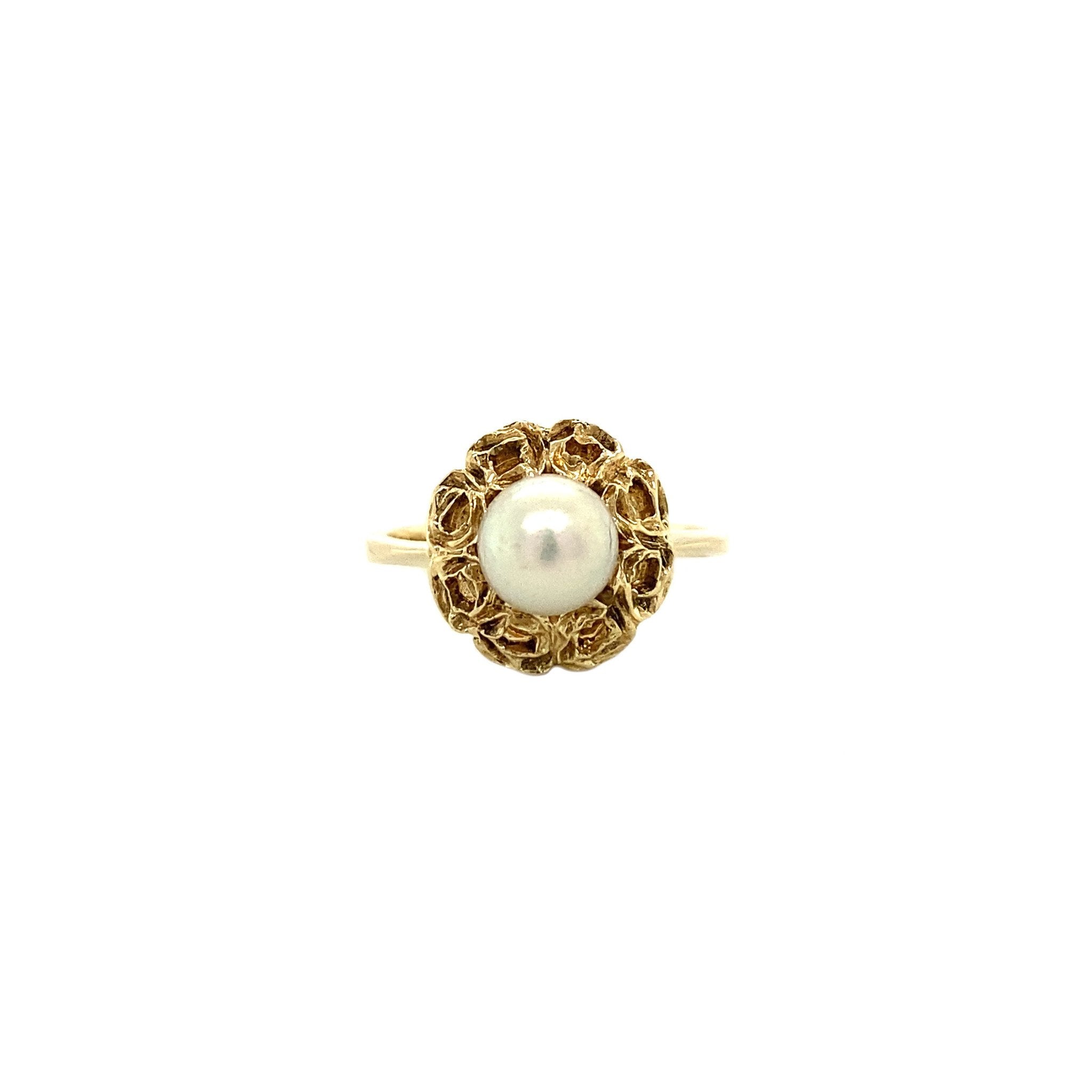 14 kt gold ring with pearl