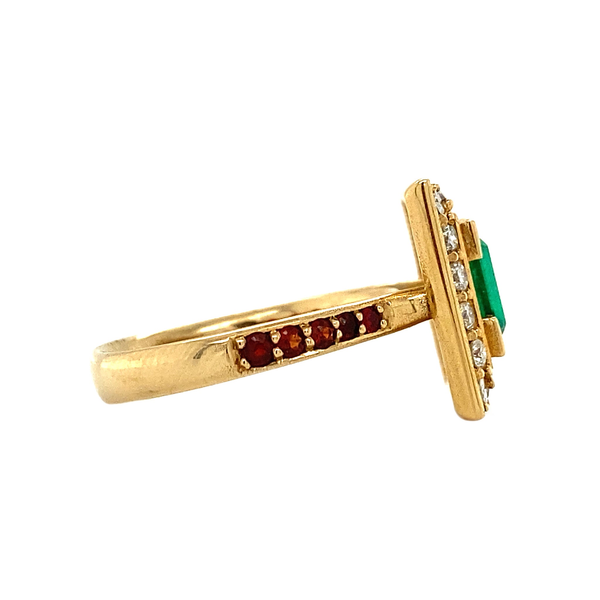 Gold ring with emerald, garnet and diamond 18 krt