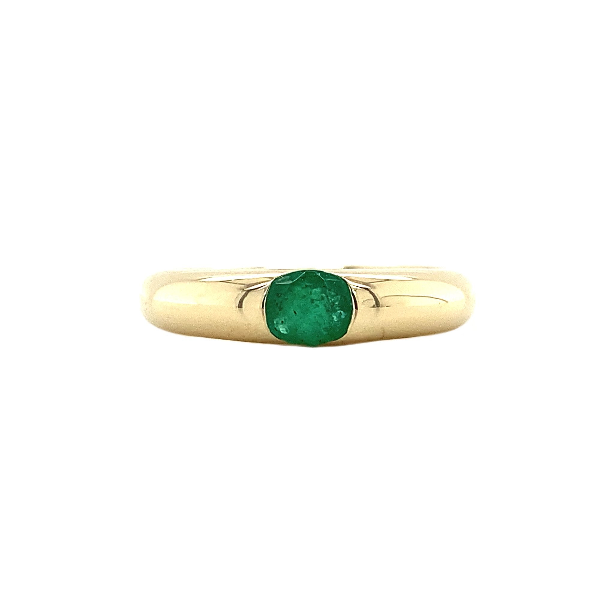 14 kt gold ring with emerald
