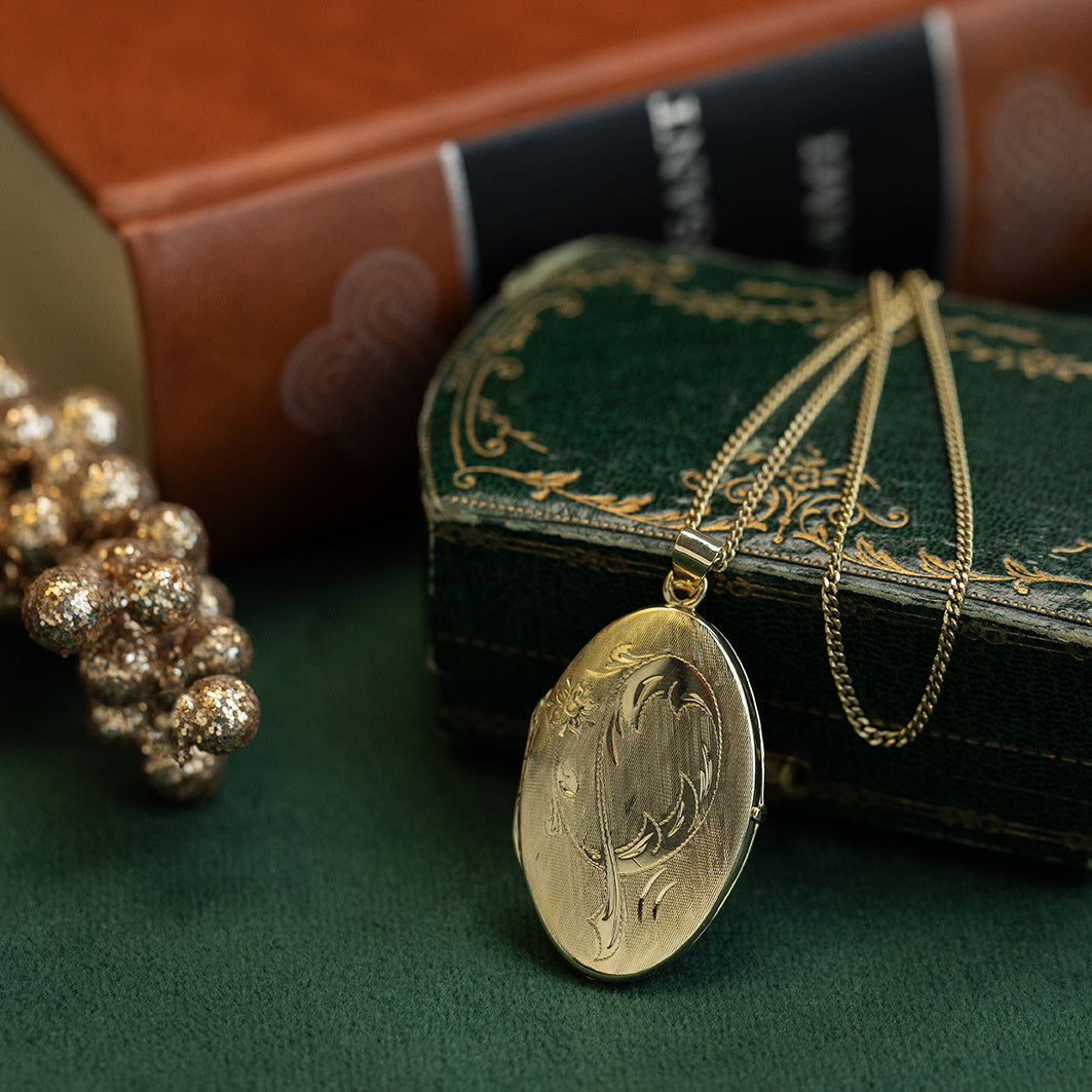 Vintage 14 kt gold locket with engraving