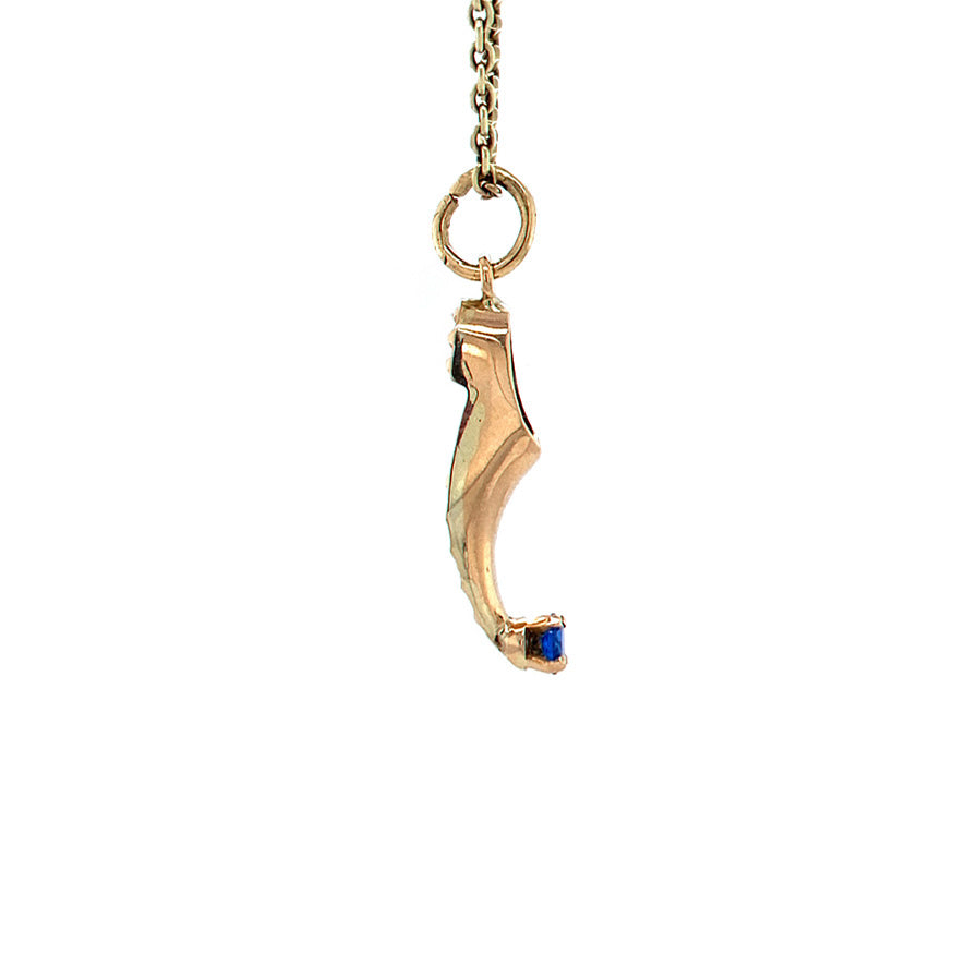 Golden vintage Arabic shoe pendant with spinel 14 kt