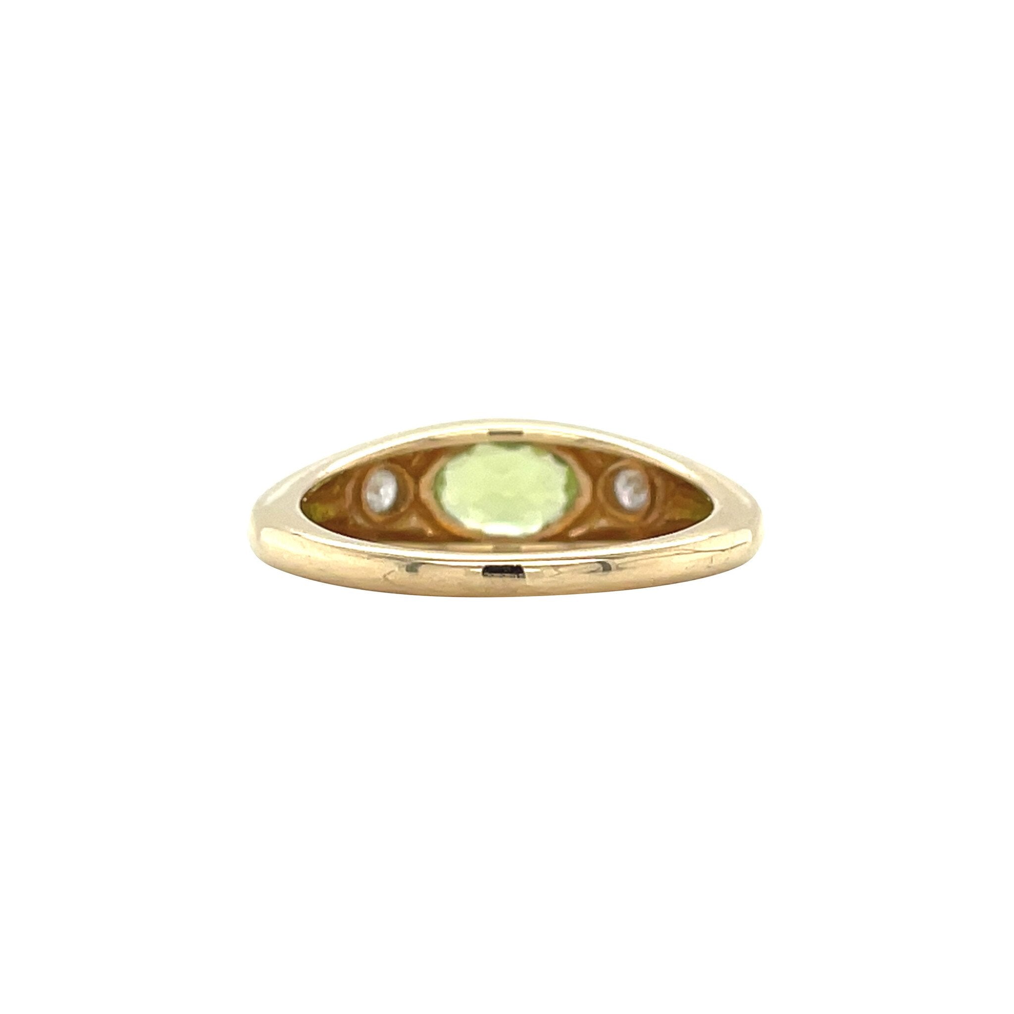 Gouden vintage ring met peridoot en diamant 14 kt