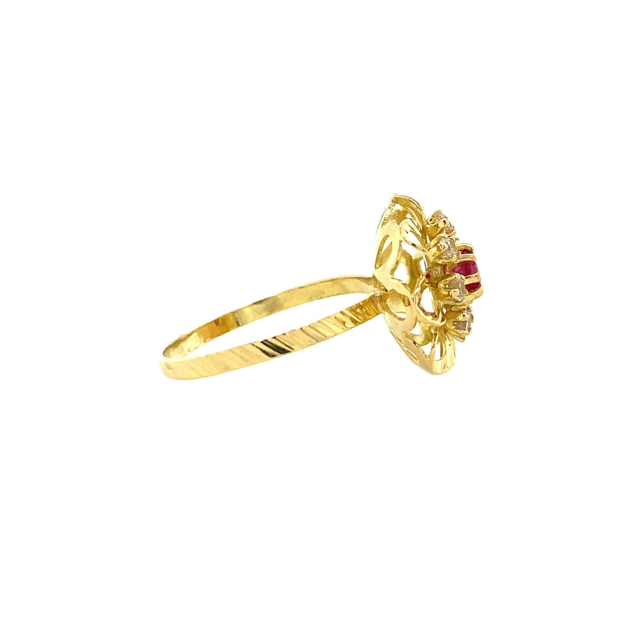 18 kt gold ring with ruby and zirconia