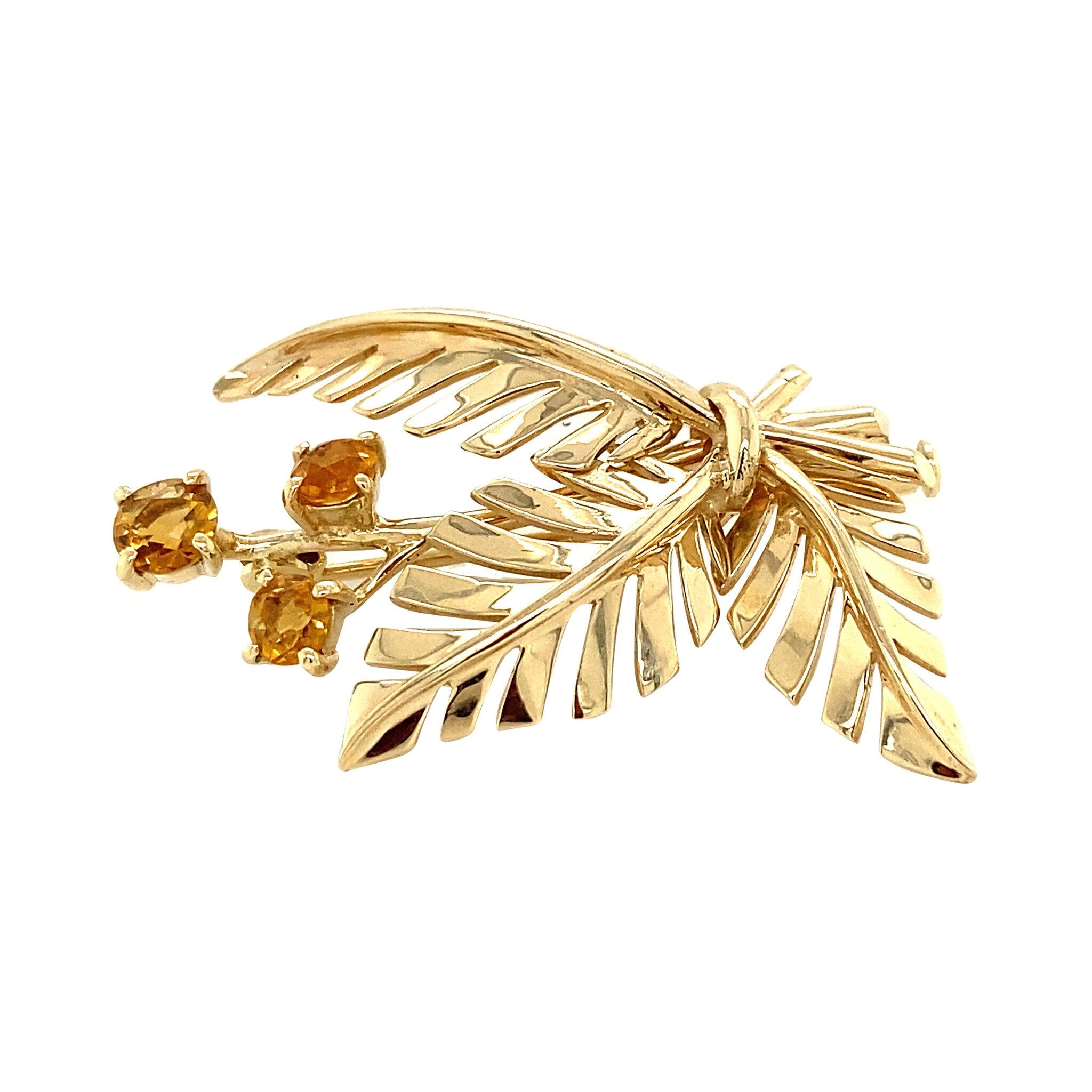 Gold brooch with citrine 14 krt