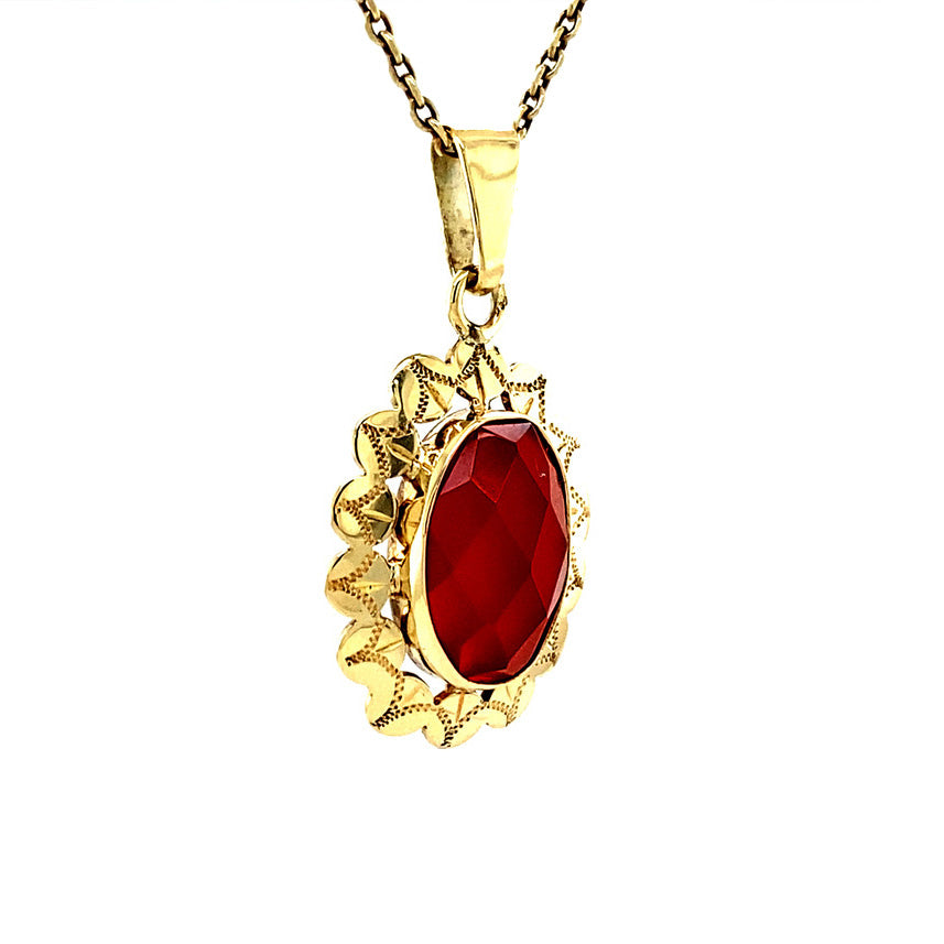 Golden pendant with carnelian 14 kt