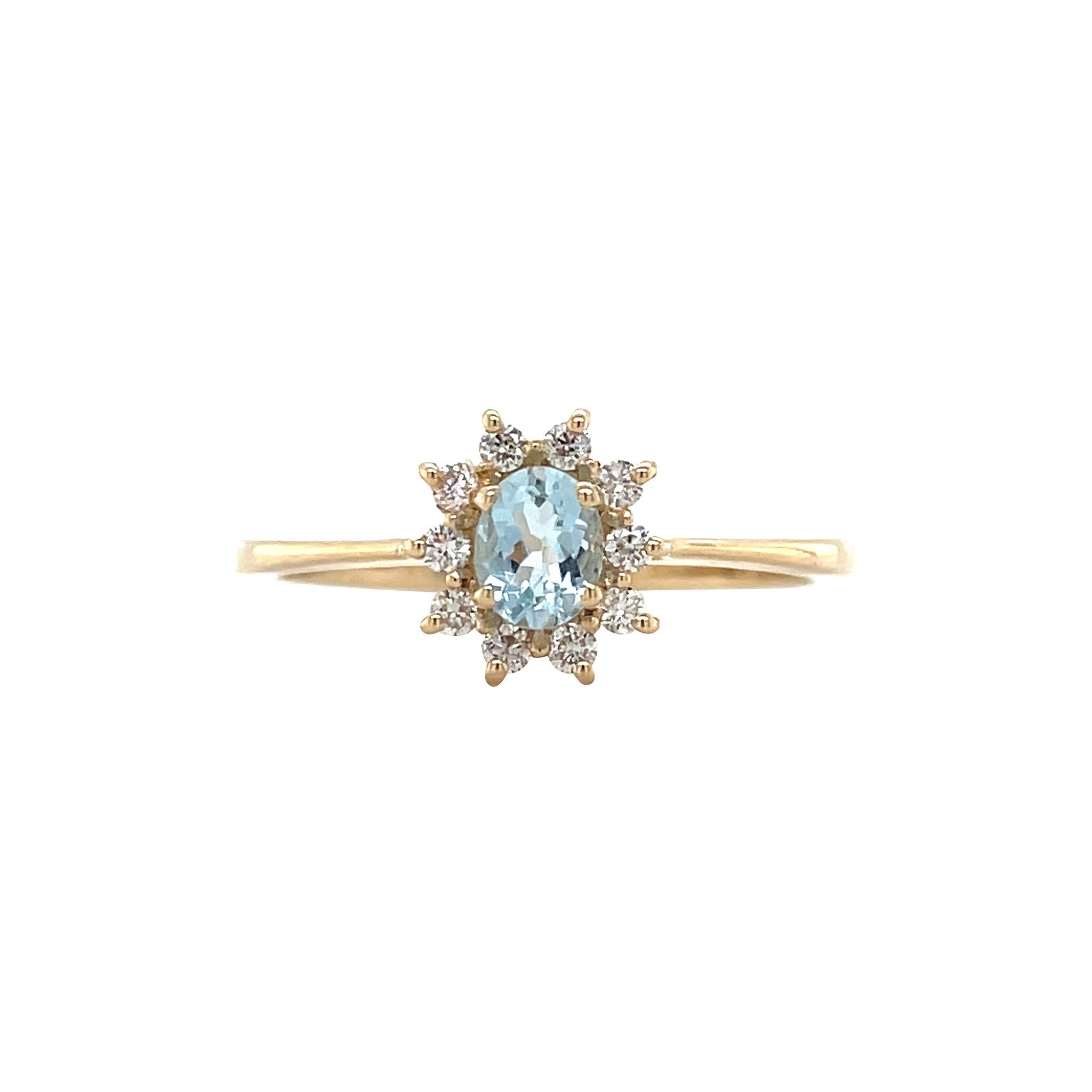 Vintage 14 kt gold entourage ring with topaz and diamond