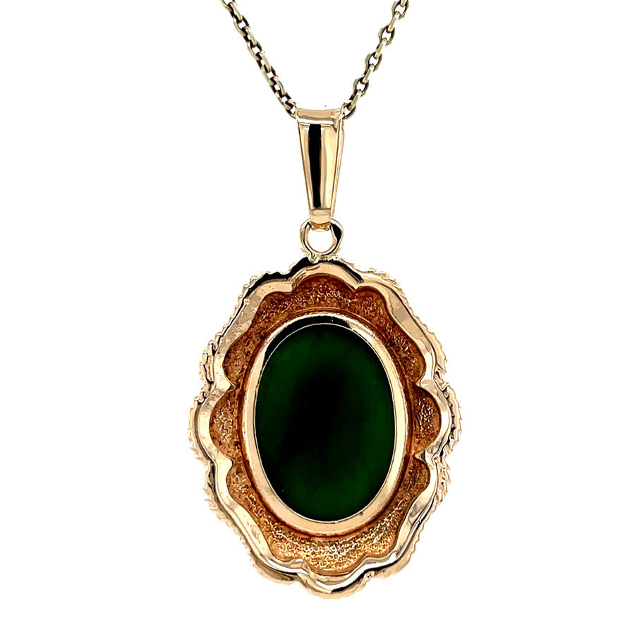 Gouden vintage hanger met nefriet jade 14 krt
