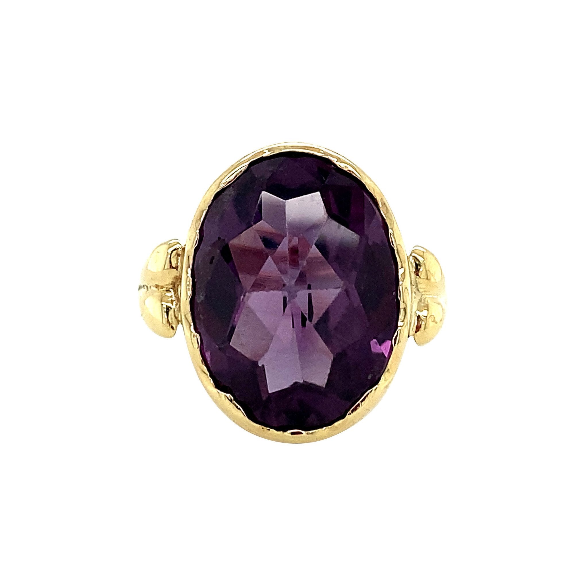14 kt gold ring with purple sapphire