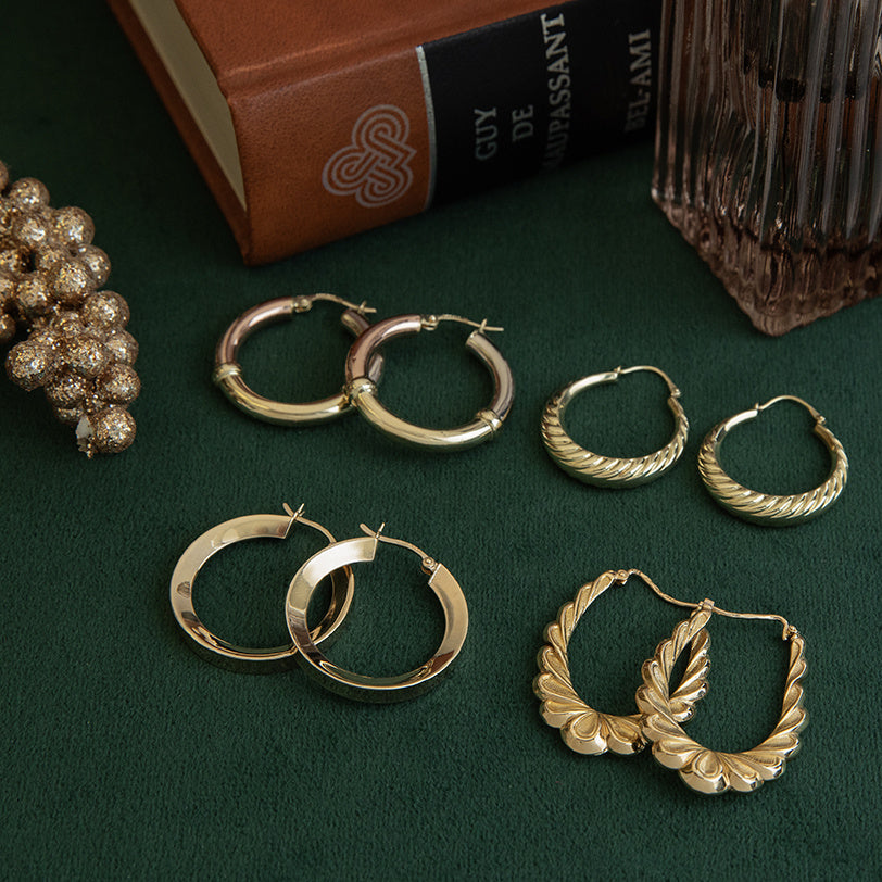 Gouden gladde vintage oorringen 14 krt