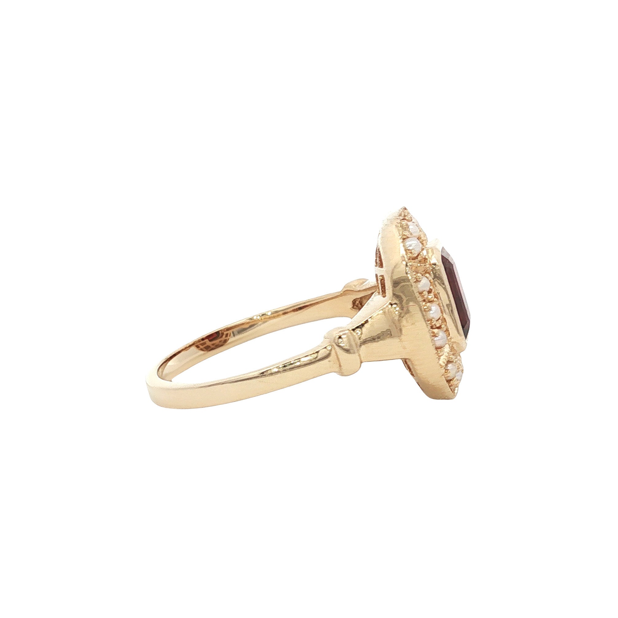 Gouden ring met granaat en parel 14 kt