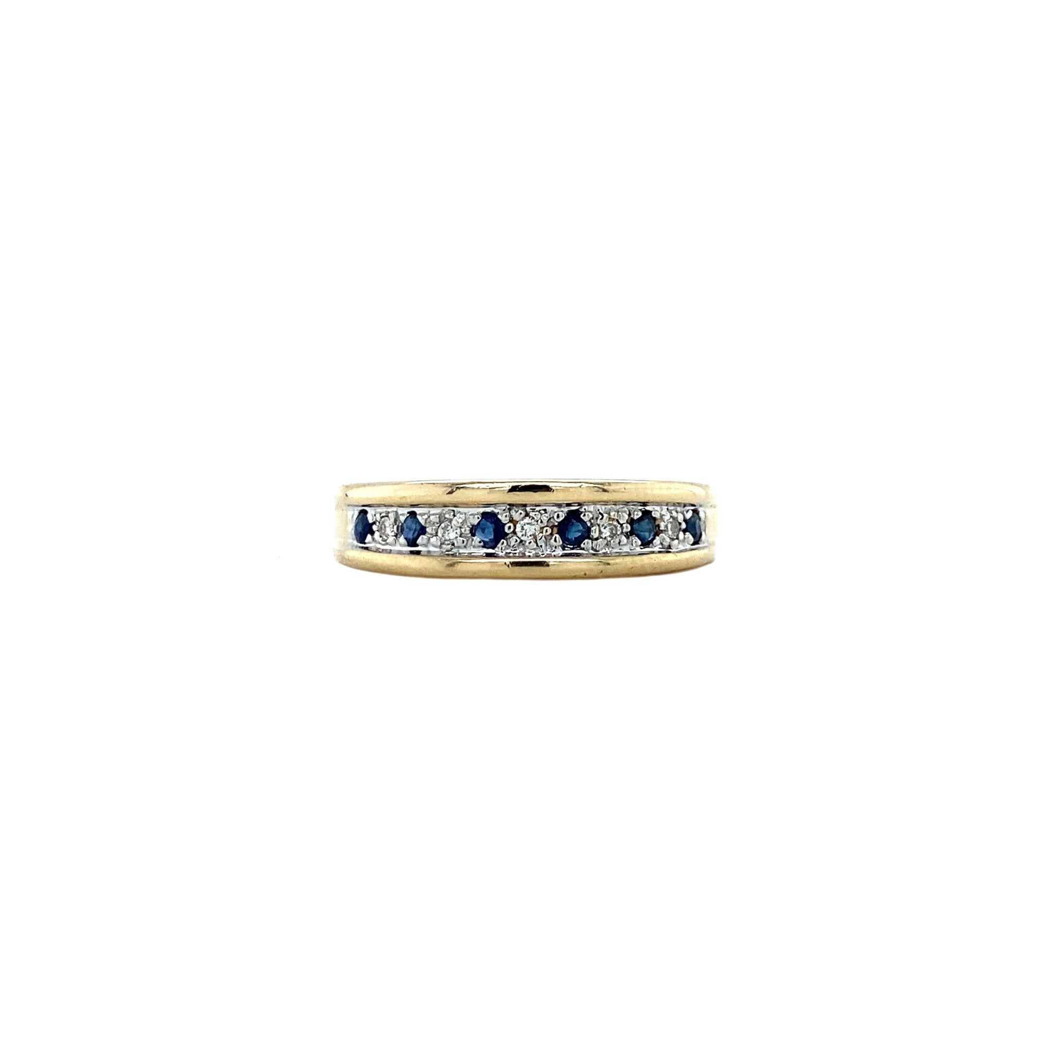 Gouden rijring met diamant en saffier 14 krt
