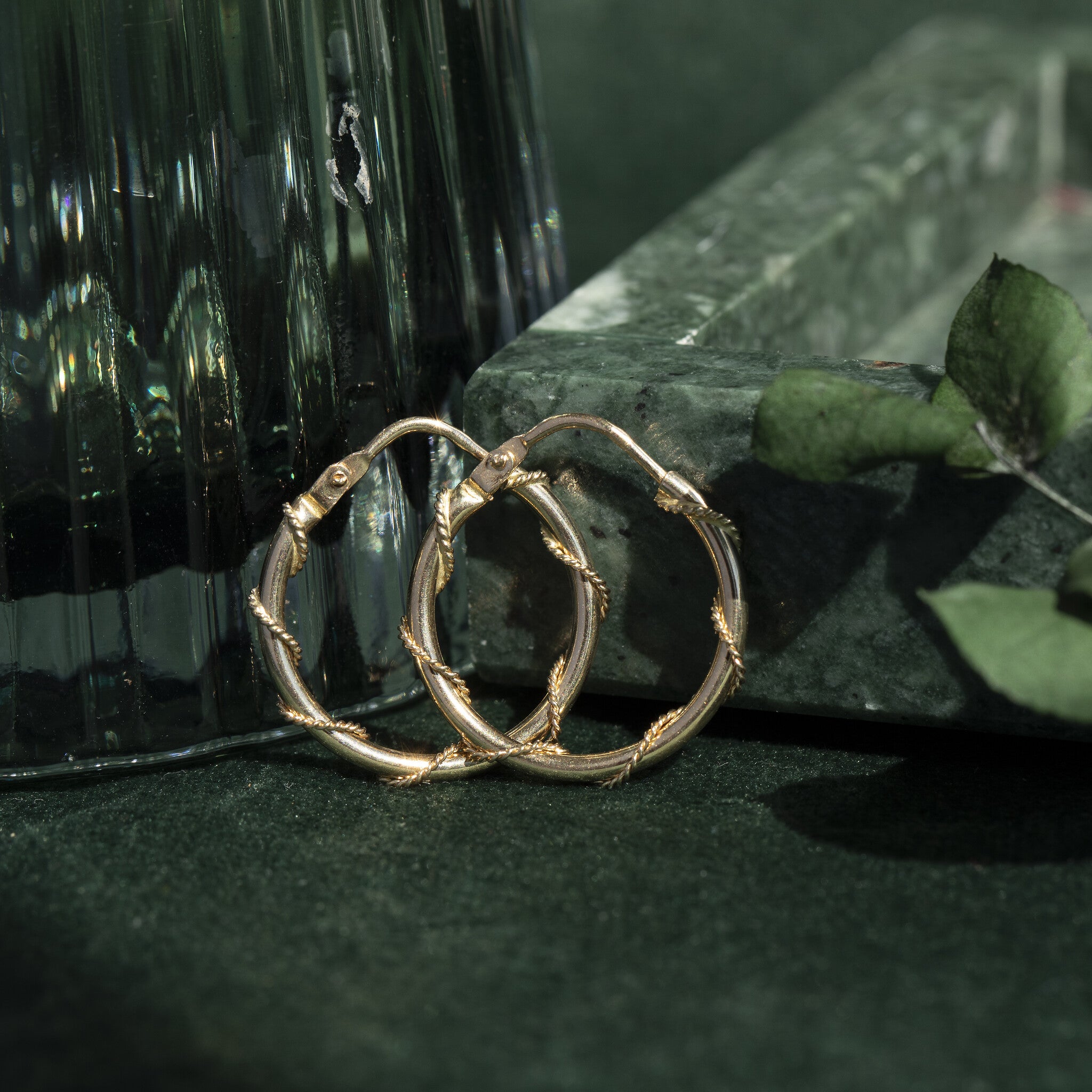 Gouden fantasie oorringen 14 krt