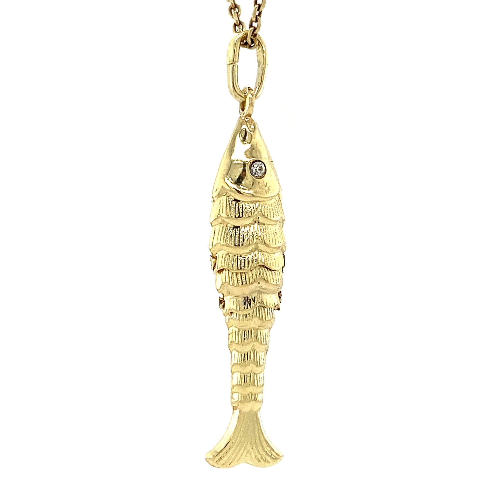 14 kt gold fish pendant with zirconia