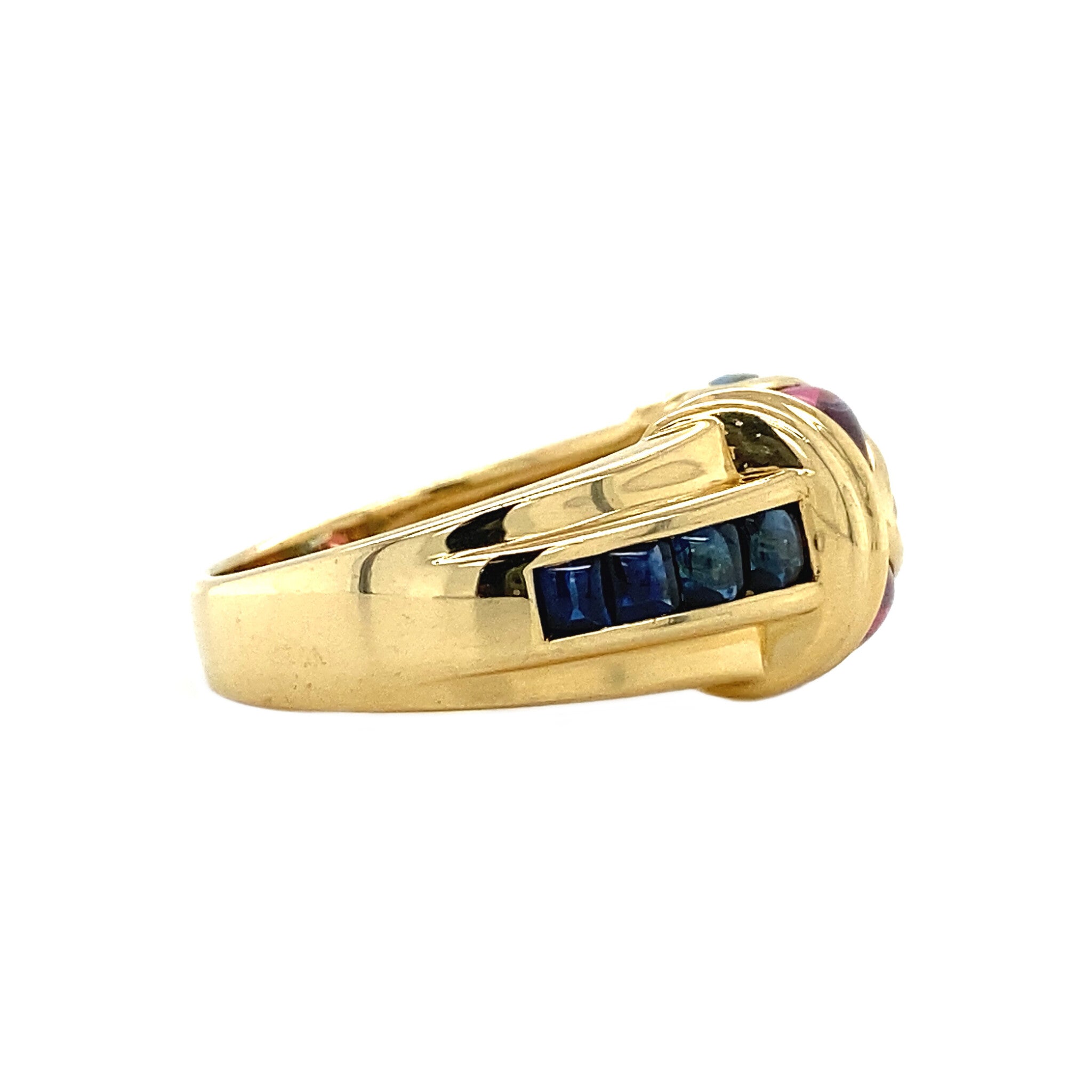 18 kt gold ring with sapphire and pink and blue topaz