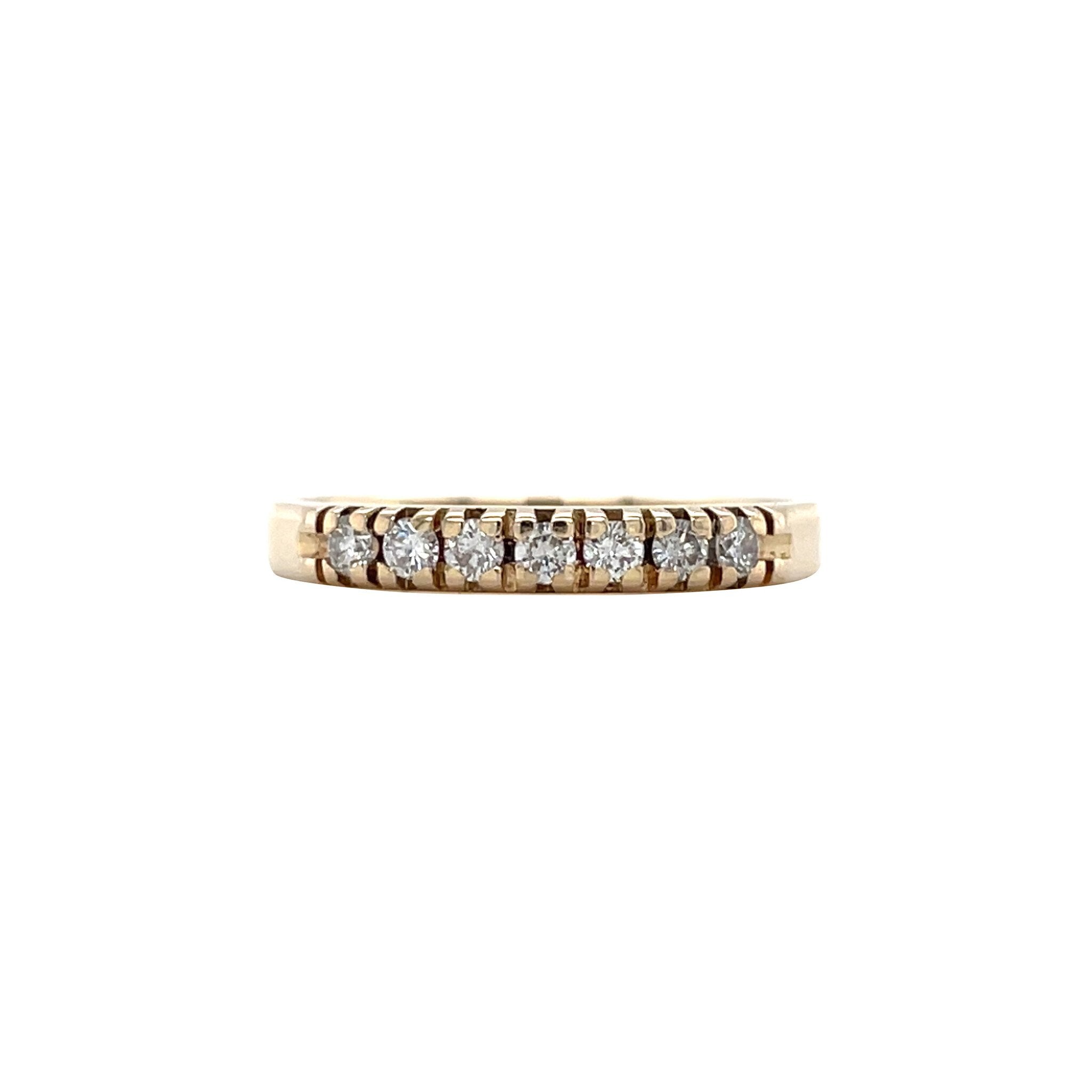 14 kt vintage gold row ring with a diamond