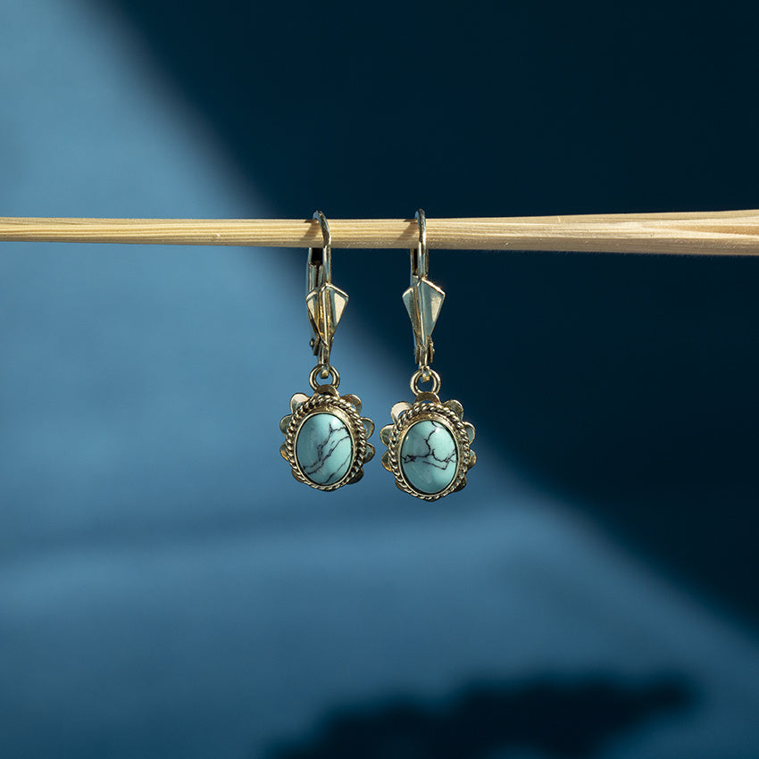 Gouden oorhangers met turquoise 14 krt