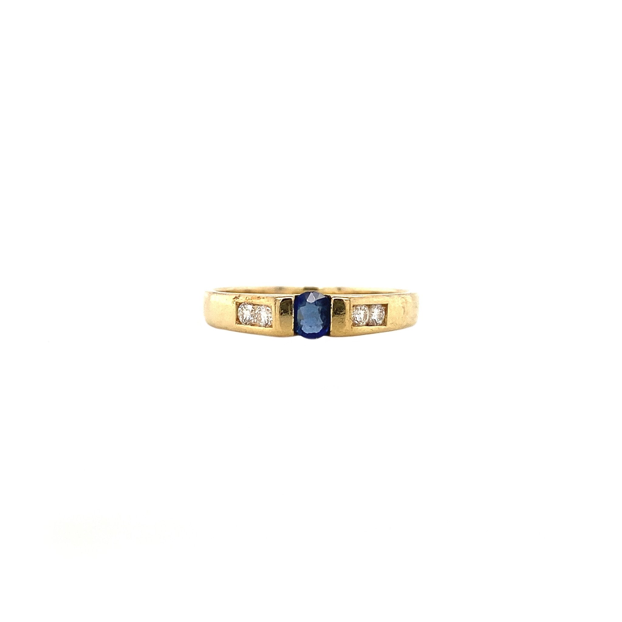 18 kt gold ring with sapphire and diamond