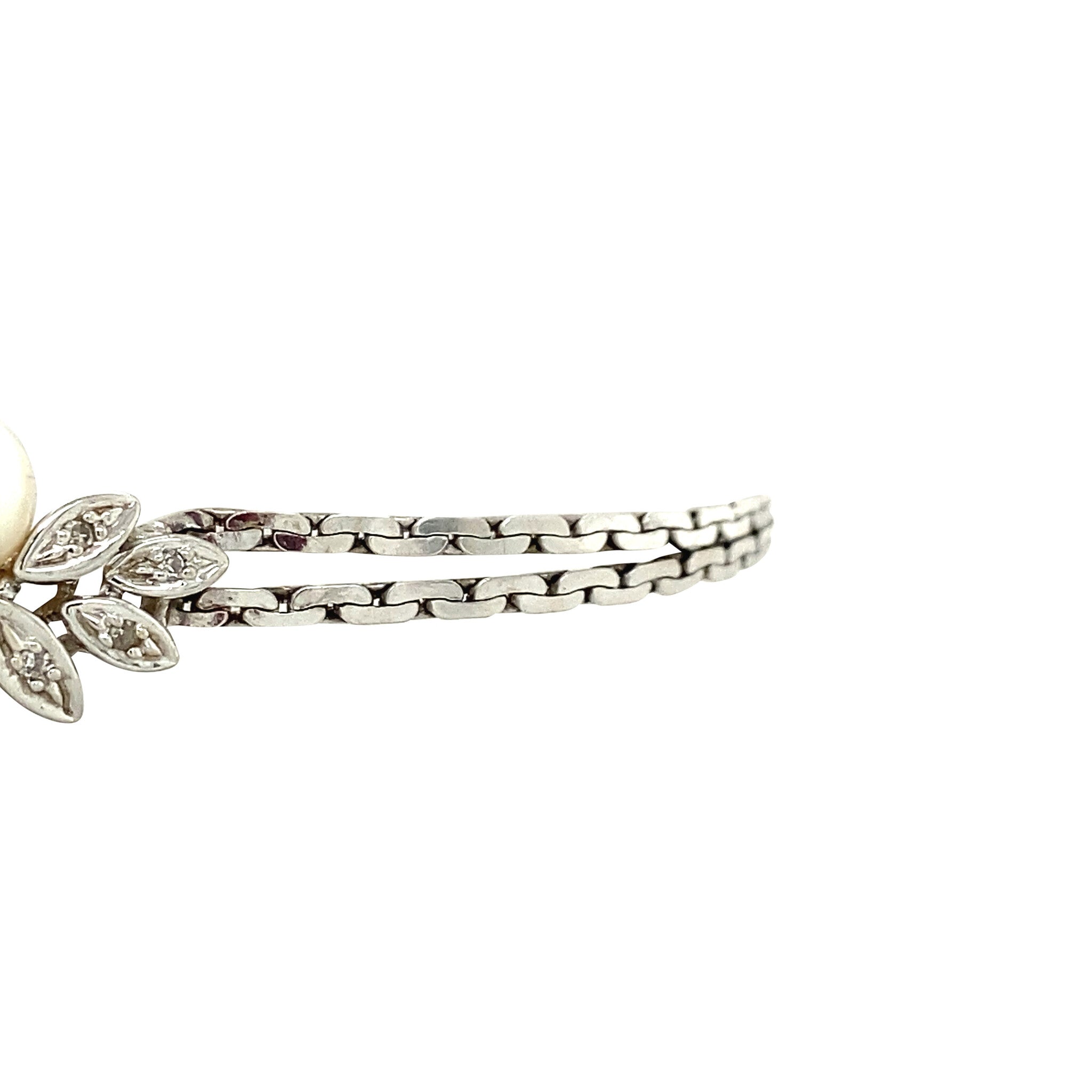 Vintage 14 kt white gold bracelet with diamond and pearl