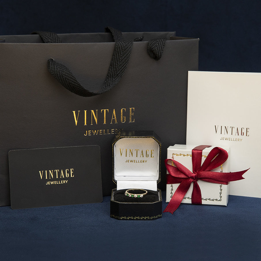 Gouden vintage ring met saffier en diamant 14 kt