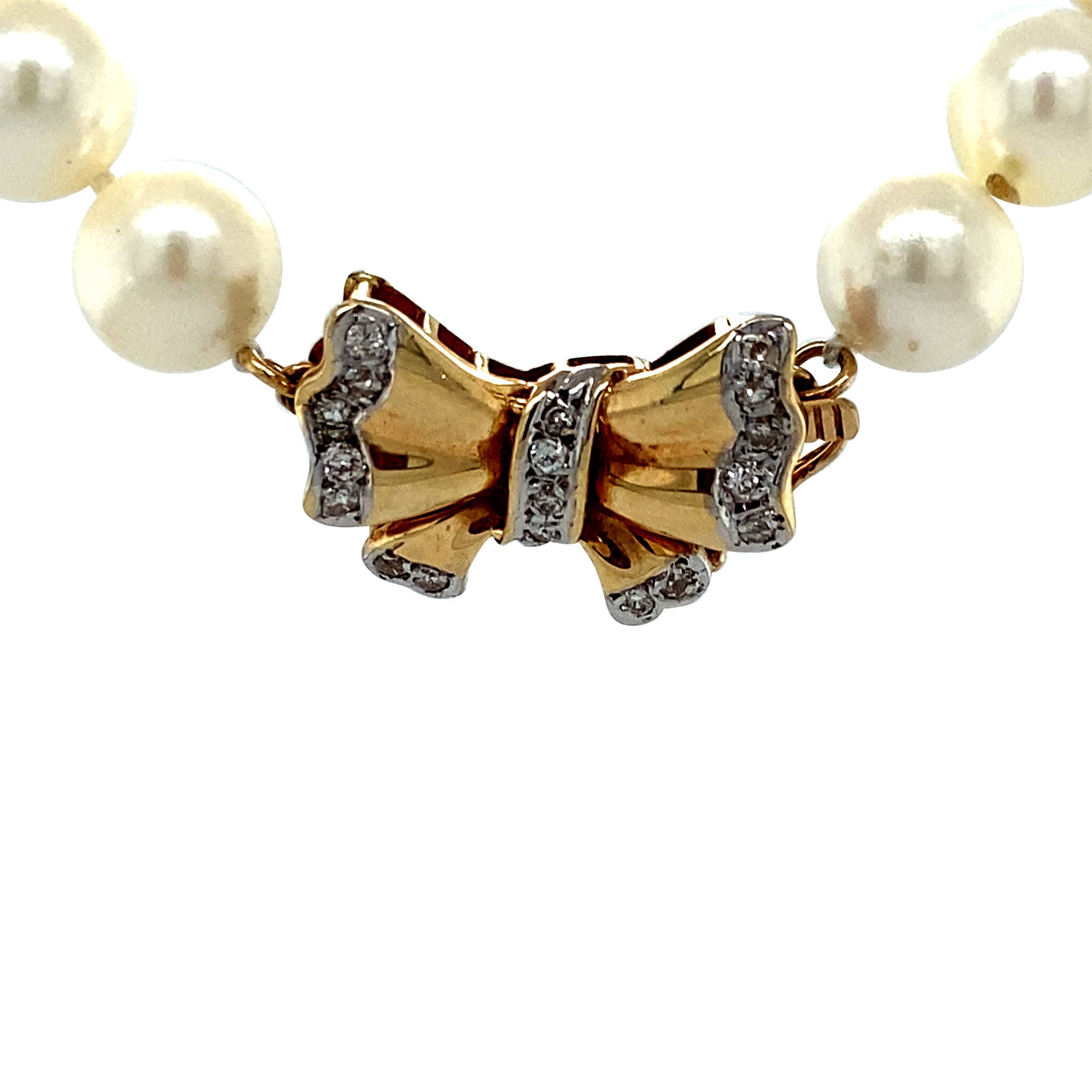 Parel collier met gouden strik sluiting 14 krt