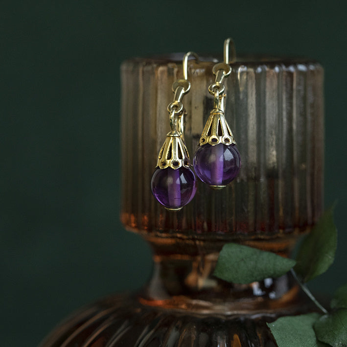 14 kt gold earrings with amethyst