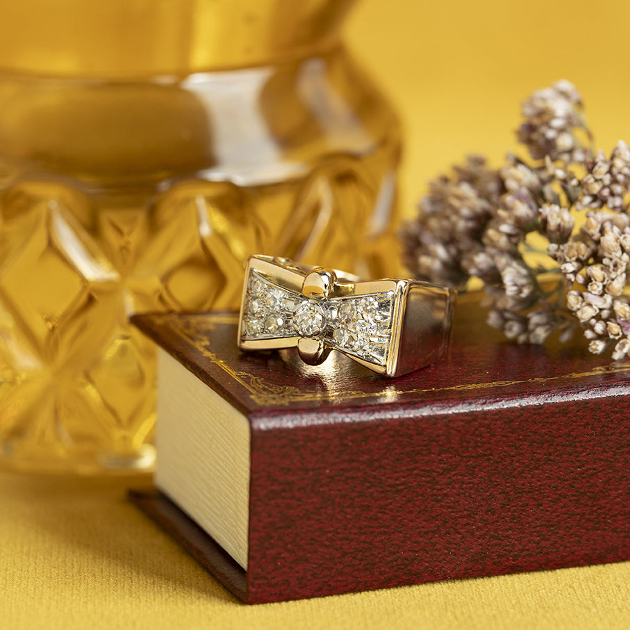 Gouden vintage strik ring met diamant 14 krt/950