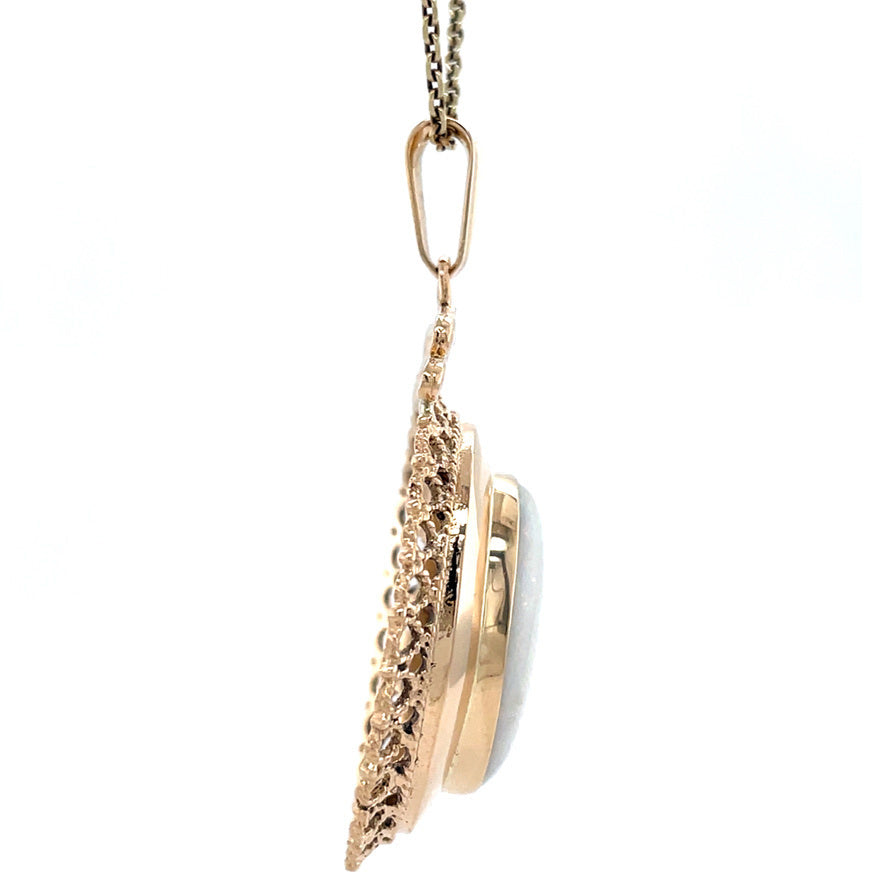 Golden vintage pendant with opal 14 kt